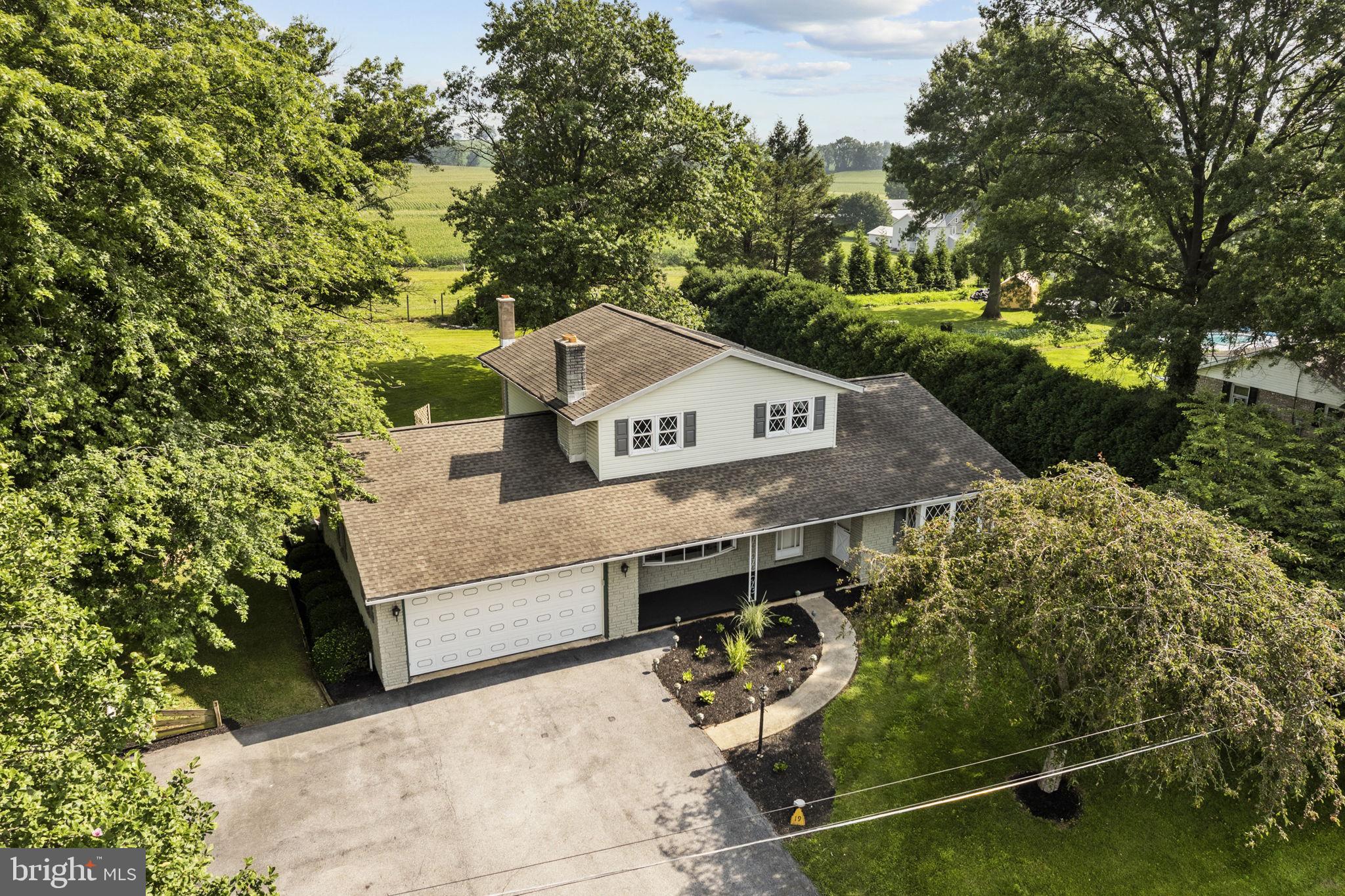 AUCTION DATE - TUESDAY, SEPTEMBER 30, AT 5 PM. LISTED PRICE IS AN OPENING BID ONLY AND IS NOT INDICATIVE OF THE FINAL SALE PRICE. ESTATE: Custom 2-story Holland stone/vinyl house w/2607 SF finished area, eat-in kitchen/dining w/custom walnut raised panel cabinets w/pantry, desk & appliances, dining area, living room w/box bay window, 1st floor family room w/stone fireplace & bay window, 1st floor laundry, 4 bedrooms, 2 full baths, full basement w/large rec. rooms, utility room, separate workshop area & cold cellar, oil forced air heat & central AC, large deck, covered patio/porch, attached 2 car garage & utility bldg. 20x12 w/electric all on level 6/10 ACRE lot w/mature shade trees, flower gardens, professional landscaping, 3300-gallon water garden w/fountain & falls, on-site well & septic. NOTE: Move-in condition home w/plaster walls thru-out & low maintenance exterior. A must-see home. Great location on no outlet street, just off Rt. 422 w/easy access to Lebanon & Reading. Terms 10% down, balance 60 days or before. Personal inspection by appointment or open house Sat., September 13, 20 & 27 from 1 to 4 PM.