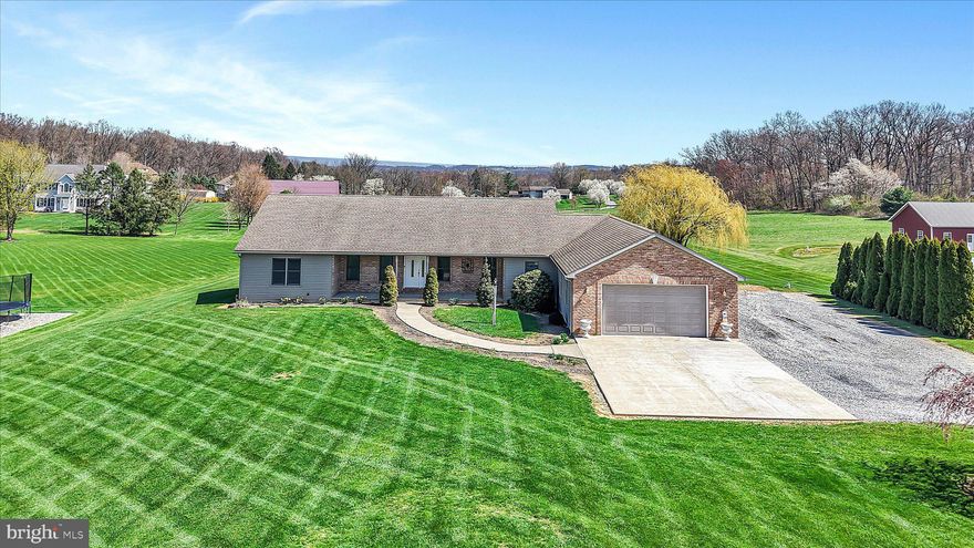 Where can you find a ranch home with a gorgeous view situated on 1.78 acres? Right here at 760 Prescott Drive! Located in the Cornwall Lebanon School District, this well-maintained 3-bedroom, 2.5-bath home offers comfort, space, and versatility. Step inside to a bright and inviting main living area featuring a vaulted ceiling that creates an open yet cozy atmosphere. The home offers ample closet space throughout, providing both convenience and functionality. Enjoy your morning coffee on the covered front porch or spend evenings entertaining on the expansive 50+ foot rear deck. French doors lead to a spacious primary suite complete with an oversized bathroom featuring a walk-in shower and a generously sized closet. The thoughtful layout also includes two additional well-sized bedrooms and a full bathroom, offering plenty of room for family or guests. For those who need storage or workspace, this property delivers, featuring two attached garages plus an additional garage space in the full basement, ideal for vehicles, equipment, or recreational toys.
With scenic views, abundant space, and flexible living options, this home is ready for its next owner. Schedule your showing today!
