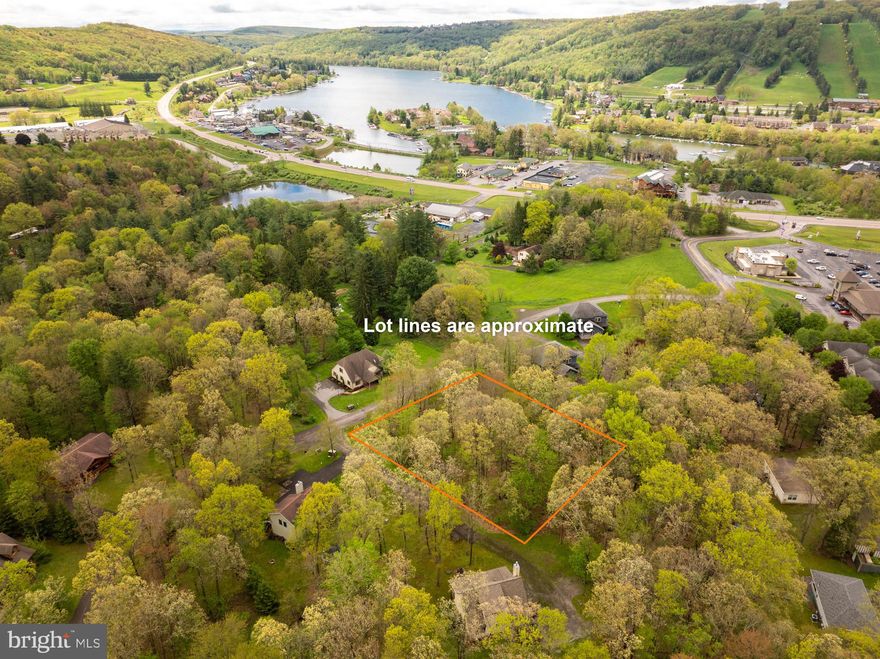 Nicely wooded building site is ready for your dream home.   Half acre lot is ready to build w/public water and sewer.  Only minutes from the winter slopes of Wisp Mountain Resort and in the heart of Deep Creek Lake.   Local marinas,  amazing golf courses, hiking and biking trails, fishing,  kayaking and superb whitewater rafting are also in very close proximity.   Shopping right around the corner and near many of Deep Creek’s local establishments and amenities.  If you’re looking for your private easy access mountain retreat, this could be your new homesite and/or potential vacation rental home investment!