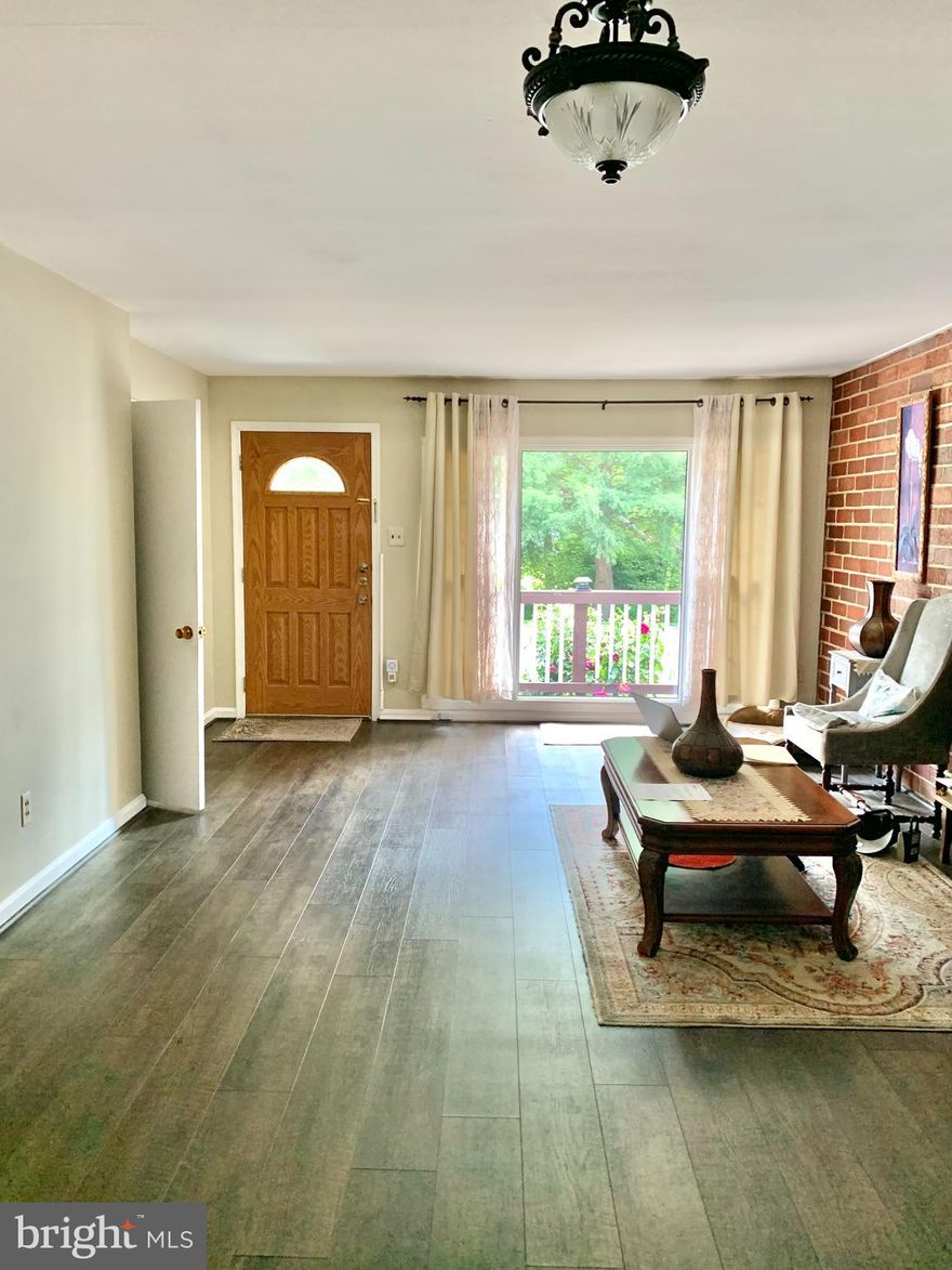 One of a kind home in the heart of Rockville blocks away from the Rockville Town Center and County Government district,  and Metro station.
Rambler with Family Room addition in the back and rear porch,  Main level with 3 bedrooms 1 Full bath and lower level with 2 additional rooms and 1 full bath plus kitchen. New Laminate Floors, Stainless steel appliances, New gas Stove, granite Counter tops, Breakfast bar, Granite mantle at Fireplace, Ample closet space in Basement....2015  Water Purifier, A/C 2016 and Furnace 2012 Plus Solar Panels 
Driveway and plenty of on street parking, facing woods, You will be amazed at the amount of room in this home and the convenience of its Location