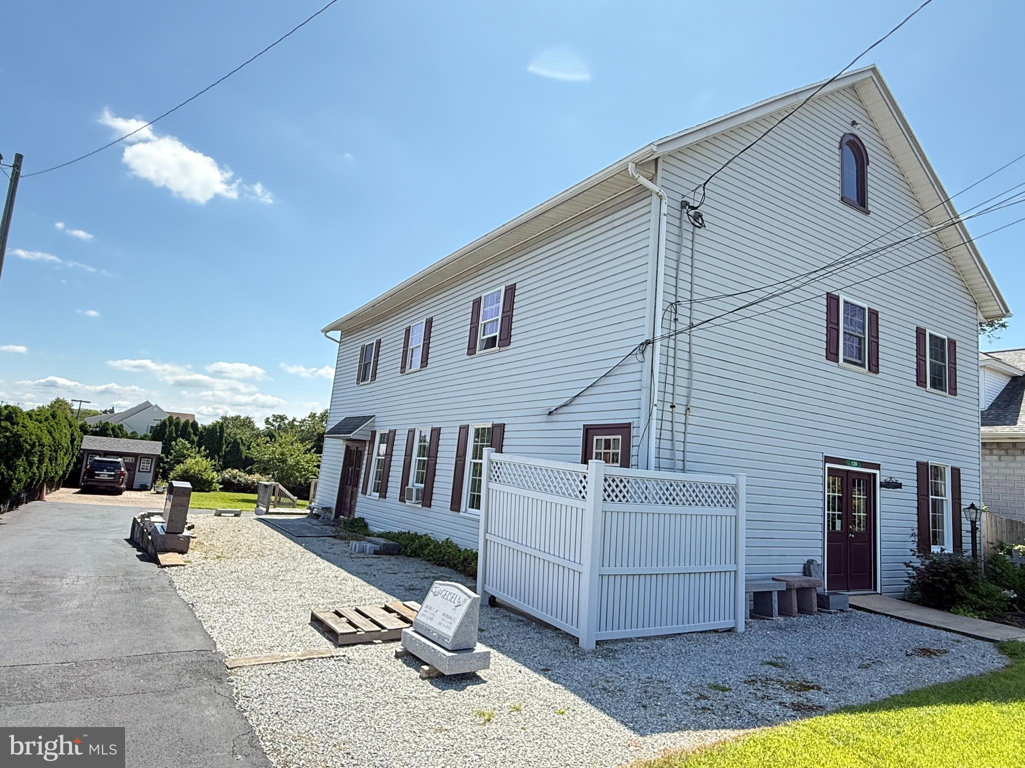 This property is being offered for sale at auction on Thursday, October 9, 2025 at 5 PM. List price is the suggested opening bid only and is not indicative of the final sale price. Open house: Saturday, Sept. 13, 20 & 27 (1-3 pm.) TERMS: 10% down day of sale; settlement within 45 days of sale. Kling, Deibler & Glick Attnys. Terms By: Barbara J. White. REAL ESTATE: 2 story stone & frame building w/vinyl maintenance free exterior walls containing approx. 3,840 SF. First Floor: 1,552 SF Open Commercial Space; 10’ x 21’ Garage with 9’10” wide by 10’ high overhead door; Office Space (220 SF) w/elec. baseboard heat; Half Bath; 8’ x 18’ Rear Deck. 2nd Floor Apartment: Large eat-in Kitchen w/vinyl floor, dbl. bowl stainless steel sink, glass top range, refrigerator & pantry; Living Room w/carpet; Master BR w/carpet; 2 more Bedrooms w/hardwood floors; Full Bath; rear entrance w/Sunroom. This apartment offers ideal living space in a desirable location w/electric heat, public water and sewer. Current rent is $1,600. The commercial space also has potential to generate $1,800 in revenue. Each unit has separate electric meters. The property is well maintained, in very good condition w/a paved drive & ample parking area, storage shed & small yard.
NOTE: Great investment opportunity w/high visibility as property is located 400’ from the square in Honey Brook and surrounded by other businesses. Zoned Town Center District, a hub for mixed-use including retail and service establishments (shops, boutiques, restaurants, cafes & personal service), offices, residential dwellings, civic and Institutional (post offices, churches, libraries), financial institutions & entertainment allowing for a broad range of uses. Taxes $3,819. Property is well maintained and in very good condition. DON’T MISS THIS AUCTION AND THIS ONCE-IN-A-LIFETIME OPPORTUNITY!!
