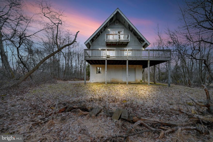 Welcome to your beautifully renovated chalet nestled in the serene Emerald Lakes Community in the Poconos. This 2-3 bedroom, 1.5 bath chalet boasts a delightful blend of modern amenities and rustic charm. Step inside to be greeted by exposed beams, a stone propane fireplace in the dining area, The surprisingly spacious layout includes a finished basement with a family room, offering ample space for relaxation and entertainment. New laminate floors add a touch of elegance, while the kitchen and main bathroom feature tile floors. French doors open onto a wrap-around deck on the first level, perfect for enjoying the outdoor scenery, while a balcony off the primary bedroom offers a private retreat. Situated on a generous .56-acre lot, this property provides the perfect blend of

tranquility and convenience. Enjoy all the comforts of home, including a large laundry area and a home office in the 2-bedroom option. With proximity to shopping, popular attractions such as Camelback, Kalahari, and the Casino, as well as easy access to highways, this chalet offers the ideal location for your Poconos getaway or primary residence.

Experience the allure of low taxes and a prime location - seize the opportunity to make this chalet your home away from home. Whether you're seeking a weekend escape or an extended stay, this chalet offers the perfect retreat for your next Poconos adventure.