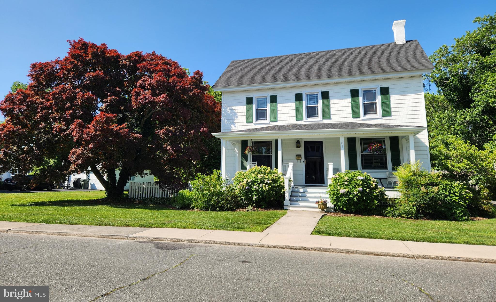 This downtown home is a rare find on one of the most sought after streets in Berlin. Deeded in 1900 this classic farmhouse has all the space you need inside and much more outside. Situated on 1.6 acres of open land planted with a variety of mature shade trees, a raised bed gardening area and a 20'x 50' in ground swimming pool. The recently rebuilt front porch is the perfect spot to peacefully start your day. Later in the day the back porch is a great spot to listen to the birds, watch a beautiful sunset then wait for the fireflies to put on a show. So much privacy on this huge lot in the heart of town.
Main Street is literally steps away with a variety of shops, restaurants, music venues, the library , and a lively farmer's market on Sundays . Berlin is proud to be a community that is "walkable and bikeable".
Come check out this property then walk up town to have a drink and discuss your moving plans!