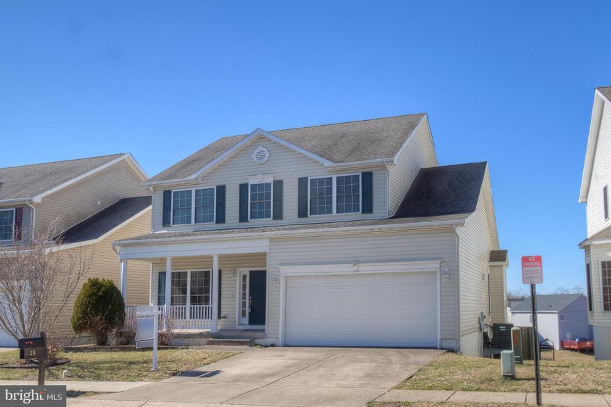 Location! Minutes to I-95, shopping, Quantico! 2 car garage w/ opener! Formal LR & DR! Family Room off Kitchen! Main level laundry complete with washer & dryer! Master suite w/ vaulted ceiling! Master bath w/ jetted tub! Lower Level with built-in TV niche, bath, office area and work out/ hobby area! 15x16 composite decking overlooking 2 Crape Myrtle Trees &! Lighted stairway! 12x8 shed! Fully fenced rear yard w/ 3 gates! Lawn maintenance covered by HOA!  Lower Level storage along! Attic is floored for additional storage!