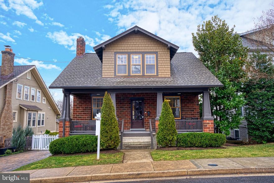 **Open Houses: Friday 2/23, Happy Hour Open House, 5 PM-7 PM, Saturday & Sunday, 2 PM-4 PM. ** Offers, if any, are due Monday at Noon. Pre-Inspections welcome. Sellers reserve the right to accept an early offer.  Beautifully renovated bungalow in the heart of Lyon Park, this gem is on the market today. This 4 bedroom (upper level), 4 bath (2 full/2 half) jewel includes an inviting front porch, generous back deck, gourmet kitchen with stainless steel appliances and a large island, lovely flat backyard, mud room, finished basement, and 1 car garage.  The home is the perfect blend of historic charm and modern conveniences. A gut renovation including all new systems, wiring, etc. was completed in 2015. Renovation done by Mickey Simpson LLC. Other features include dual AC Units, dual water heaters, 36" dual fuel Wolf, 36" subzero, Insinkerator, under-counter water filter, stacked Whirlpool Duet Washer/Dryer, furnace (2015), and EV car charging outlets (x2) - by the chimney and in the garage. The roof on the main house was replaced in 2022 (warranty docs will be provided). The garage was built in 2019. All exterior doors except the original entry door are Anderson and all faucets/shower heads/spouts are Grohe. The toilets are Duravit and every bedroom has ELFA closet systems. Upper-level bedrooms (excluding primary) have original Heart Pine flooring. The icing on the cake, this gem is ideally located, down the street from Clarendon, the Metro, and Trader Joe's, and a few blocks from the Lyon Park Community Center & Park, Long Branch Elementary, and Rockwell Park. In addition, Dominion Hills pool membership will be conveyed to new owners, upon approval from the pool's Board of Directors.