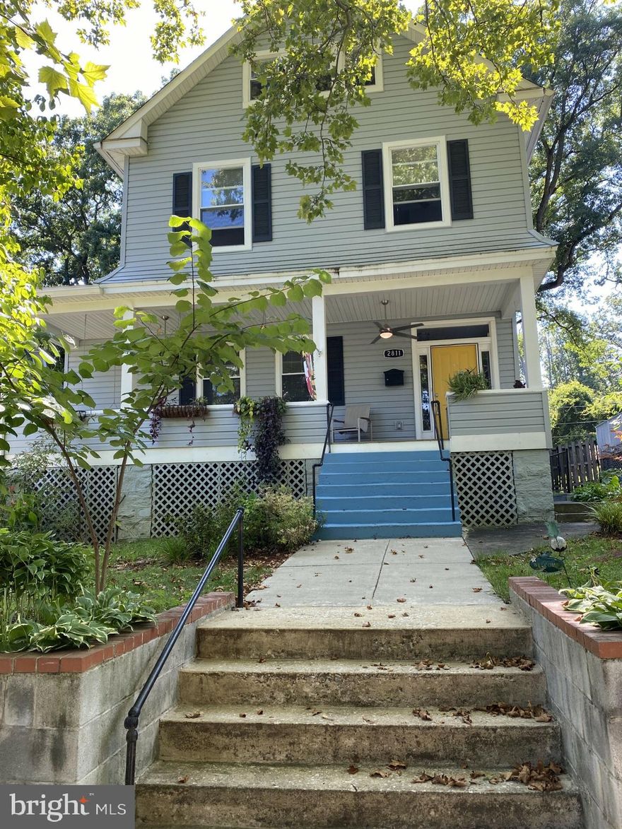 This charming home located in the Lauraville historic district of Baltimore was built in 1914 and exudes character. With a total of 6 bedrooms and 3.5 bathrooms, this home has plenty of room and is perfect for those who love to entertain. The exterior of this home has a beautifully landscaped front yard, an inviting front porch that extends the width of the house, a large backyard and a detached 2-car garage with extra storage loft. Driveway has room for at least 3 more cars in the gated back yard. The generous sized lot provides ample space for gardening, playing or simply enjoying the fresh air.The interior features a mix of original details and modern updates, creating a perfect blend of old-world charm and contemporary convenience. Completely renovated in 2017 with a spacious open floor plan and recessed lighting on the first floor -- including kitchen, dining area & living room. Kitchen has quartz countertops, an island with breakfast bar, plenty of cabinets & a suite of stainless steel Frigidaire appliances -- 5 burner gas stove, farm sink, DW, microwave & refrigerator with water/ice dispenser. First floor also has a powder room and office. Upstairs, the bedrooms are spacious and bright, with plenty of closet space for all of your storage needs. Some closets have been updated with organizers. All the bathrooms have been completely redone with modern fixtures and finishes, creating spa-like retreats for relaxation and pampering. The MBA has a huge soaking tub, a separate large, glass enclosed shower and a double sink vanity with plenty of storage. Additional details include a new roof in 2017, 2-zone climate control, ceiling fans in every room, beautiful hardwood floors on the first floor and in the MBR, and a fully finished basement with laundry room and sump pump. House is .2 miles from restaurants, grocery and shopping on Harford Rd and .5 mile from Herring Run Park and Trail.Overall, this home is move-in ready and a true gem in the heart of Baltimore. With its historic charm, modern updates, and ample living space, it is the perfect place to call home. Don't miss your chance to make this property your own and start creating memories that will last a lifetime.