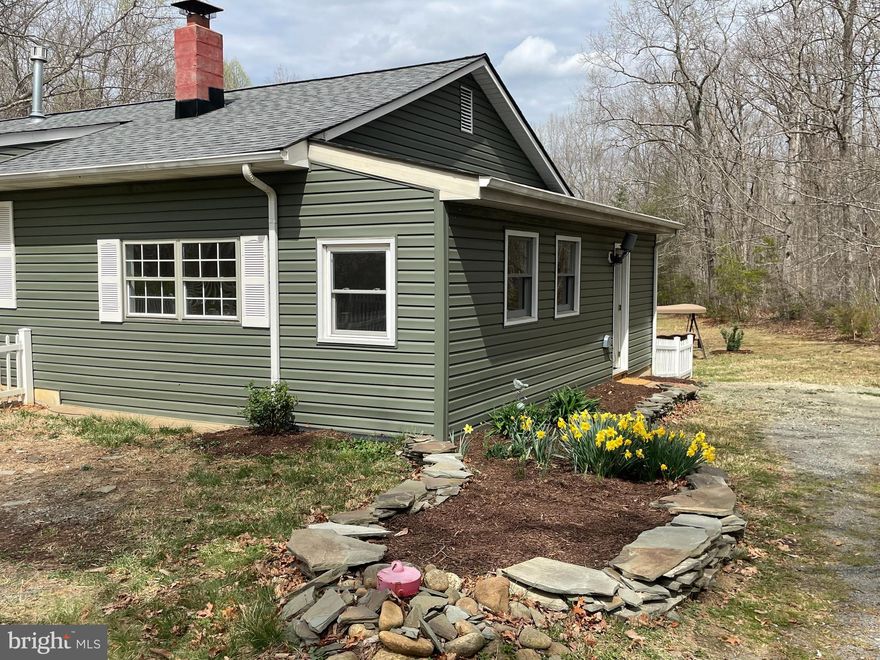 Charming 3-Bedroom Home at 5458 Summerduck Rd, Sumerduck, VA ** New Roof **
Nestled in the peaceful rural setting of Sumerduck, VA, this charming 3-bedroom, 2-bathroom home offers the perfect blend of comfort and country living. Situated on 3 beautiful acres with a run-in shed, it provides plenty of space for outdoor activities and enjoying nature.
Step inside and be greeted by a warm and inviting living room, complete with a charming gas fireplace—perfect for cozy evenings. The bright and spacious bonus room provides endless possibilities, whether you envision it as a home office, playroom, or an additional entertainment space.
The freshly painted interior enhances the bright and welcoming atmosphere, while new carpeting in the bedrooms adds extra comfort. Vinyl flooring runs throughout the balance of the home, offering durability and easy maintenance. The home also features two well-appointed bathrooms, including a private ensuite in the primary bedroom for added convenience.
The kitchen and dining area flow seamlessly onto a lovely back deck, offering the perfect spot to enjoy your morning coffee or unwind while watching the sunset. The expansive outdoor space provides plenty of room for gardening, outdoor activities, or simply soaking in the tranquility of the surroundings. A fire pit adds to the outdoor charm, making it an ideal spot for gathering with family and friends on cool evenings.
With its thoughtful features, this home is an excellent opportunity for anyone seeking a peaceful retreat in Sumerduck. Don’t miss your chance to make this charming home yours—schedule a showing today!