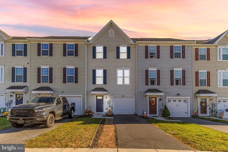 MOTIVATED SELLERS OFFERING CLOSING COST ASSISTANCE!!! Welcome to this beautiful three-level townhome with a garage that’s move-in ready and waiting for its new owners! Freshly painted and brand new floors throughout all levels. This home offers an open and spacious layout with a huge kitchen island, perfect for entertaining or gatherings. The main level flows into a bright living area, while upstairs you’ll find a primary suite with tray ceilings and generous closet space. The finished basement offers a flex space that could serve as a fourth bedroom, home office, or rec room, complete with a convenient half bath. Step outside to enjoy the fenced-in yard and outdoor patio, ideal for grilling or relaxing. Guests will love the plentiful parking just across the street. Outdoor patio area with fenced yard, Sought-after Spring Mills school district, easy access to I-81, Maryland, and Virginia for commuters. This home checks all the boxes: convenience, style, and comfort! Don’t miss your chance to make it yours.