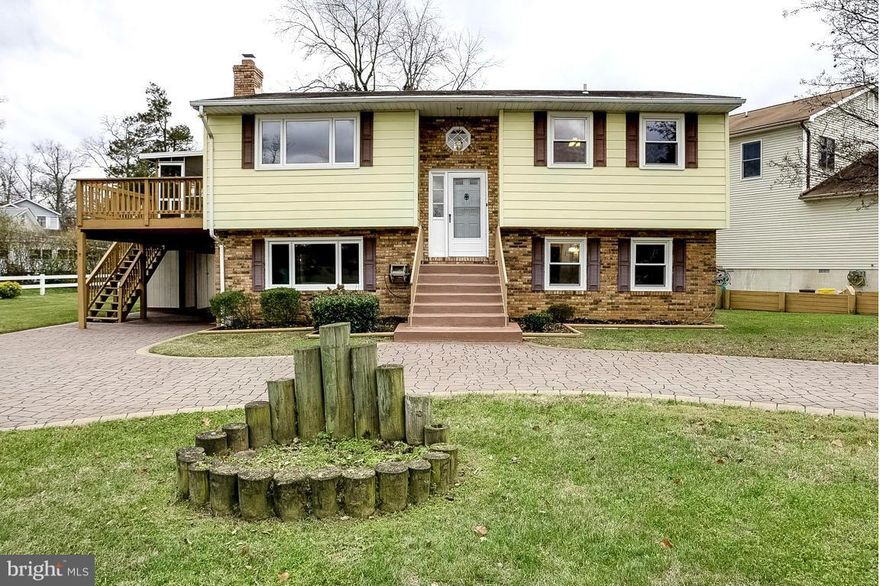 Beautiful lot with welcoming circular drive. Home shows great and is very clean with newer windows and awaiting your personal touch!  Large in-law suite w/ wood-burning fireplace & full kitchen.  Wonderful screened in porch for summer nights & large grilling porch for entertaining. Fenced back yard with lovely pool & new pool cover, large side yard and across the street from community play area!