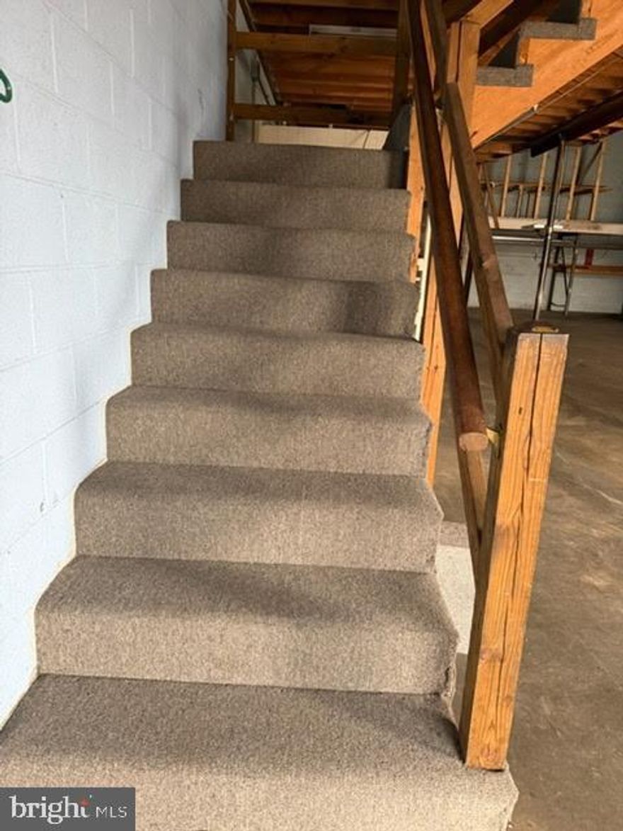 Warehouse condo for sale offering great location and business potential. The unit features a spacious open layout, including an upstairs office with two rooms, high ceilings, and a drive-in door for easy loading and a half bath located downstairs. Zoned I-1; Industrial in the City of Manassas Park allowing for many uses by-right including warehouse/distribution, storage, manufacturing, contractor's shop, laboratory, and more! Well located unit in established Conner Square center. Just one mile from Rt. 28/Centreville Rd. providing easy access to I-66/Fairfax County. Square footage is approximate. Please verify sq footage for your information. Will have photos by 2/19/202