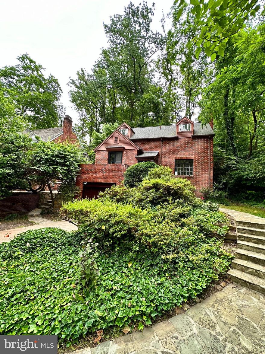 This recently renovated 1930's classic beauty is nestled in a tree-filled neighborhood and is an oasis to fast-paced city life, yet conveniently located to everything! 

Step into instant character for unobstructed sight lines of the dining room, living room, and original staircase! 
Dining room offers original and restored hardwood floors. Ample room to host memorable entertaining and dinner parties. This unique dining room comes with a Juliet porch where you can turn your every morning coffee routine into a peaceful sanctuary before starting your busy day. The kitchen has been meticulously designed with your culinary passions in mind. Enjoy countless hours of cooking in this inviting space, complete with modern appliances, custom countertops, and custom cabinetry to accommodate all your needs. For an enchanting dining experience, step outside through the sunny kitchen door and indulge in al fresco meals on your private stone patio. Sizable living room with plenty of natural light, hardwood floors, and a wood-burning fireplace. Upstairs you'll discover two generously-sized bedrooms, a full bathroom, and an abundance of closet space, perfect for the shoe enthusiast in you! Need a remote office, workout room, or a sunny spot to relax? Look no further than the fully enclosed four seasons sunroom, offering endless possibilities for utilizing the space throughout the year. This remarkable gem continues to the lower level with a garage workshop, a haven for creative pursuits and an ideal place for a game room suited for all ages! Lower level also houses a laundry area with brand new washer and dryer and some additional storage. 
Perfection meets convenience as this home is minutes away from the vibrant delights of Del Ray, 10 minutes to the heart of Old Town Alexandria, and situated inside the Beltway with easy access to Reagan International Airport and Downtown DC. You'll have endless opportunities to immerse yourself in the best of the surrounding areas when you decide to leave the retreat of this one-of-a-kind home!