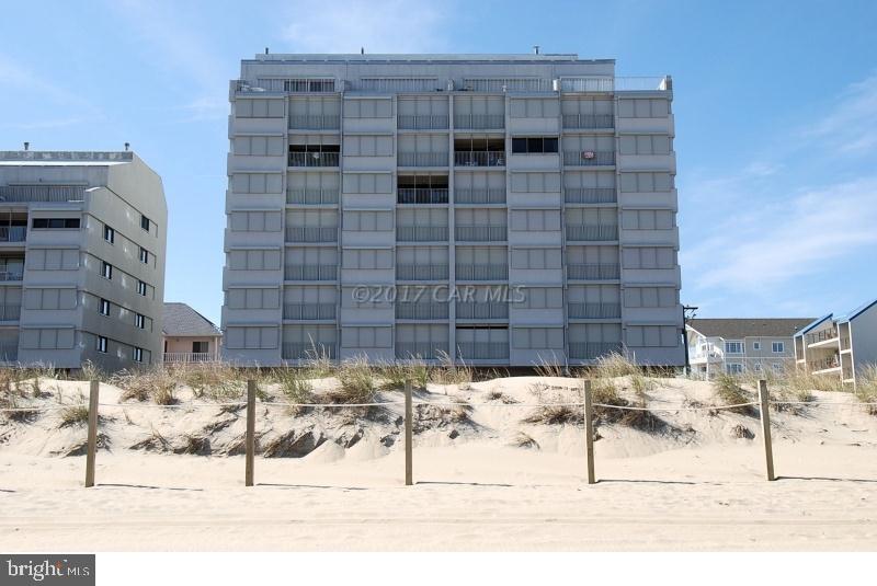This charming comfortable direct ocean front mid-rise condominium building has many elegant details including custom remodeled kitchen with the granite counter top. The vintage style building features units that combine the cozy feel of a smaller unit with the space of a large luxury condominium. This beauty is located at a prime south end with a spectacular ocean view from all living areas and master bedroom. Additionally, side windows provide south-west bay view from both bedrooms and the ocean front master bedroom has balcony access. The building is conveniently located near the Downtown Ocean City. Great location with walking distance to many great restaurants and fun activities for children and for your evenings. The east facing balcony gives you the sights and sounds of the beach,