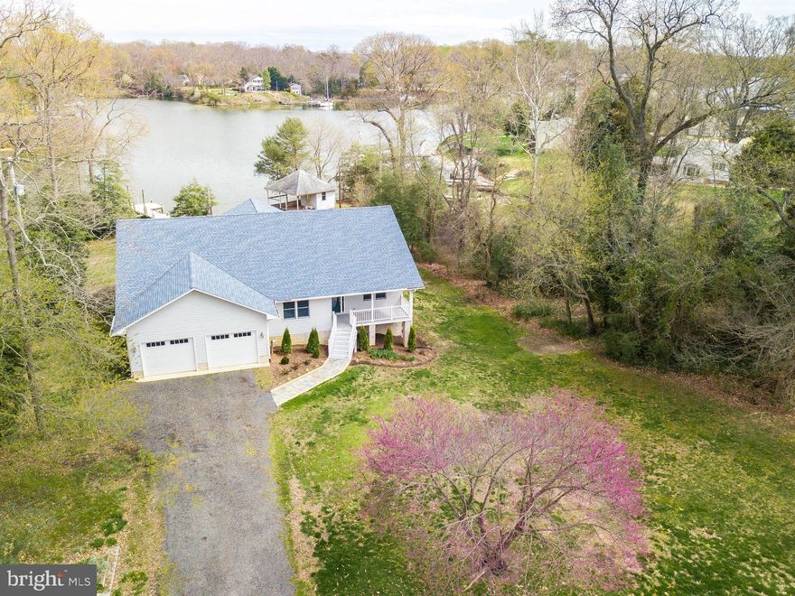 Waterfront Rambler on  Cuckold Creek.  3 bedroom 2 full bath.  Screened in porch  overlooking the creek.  2 car garage + a 1 car garage for the boat and a workshop.   Turn key.  Nothing to do but move in.  Pier with a boat lift .  Water and electric to the pier.  Main house is all on 1 level.  OWNER WILL LOOK AT ALL OFFERS!!