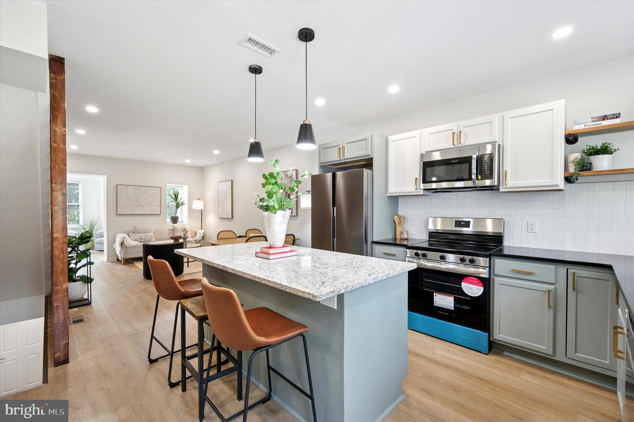 Welcome to 443 W Abbottsford Ave—where charm meets modern convenience in this beautifully renovated 3-bedroom, 2.5-bath home across the street from Fernhill Park! Step into a bright and inviting sitting area, flooded with natural light and complete with a convenient half bath for guests. The main level also boasts an open-concept layout perfect for entertaining, seamlessly connecting the living, dining, and kitchen spaces. The stylish kitchen, with an abundance of space and cabinets, leads to a deck overlooking the rear yard. A perfect spot to enjoy the warm, summer nights. Downstairs, a fully finished basement offers flexible additional living space, a full bathroom, and a dedicated laundry area. Upstairs, you’ll find three comfortable bedrooms and another full bath. Out back, enjoy a partially fenced yard and the rare bonus of your very own parking space. This turnkey home combines thoughtful upgrades with practical touches throughout. New underground sewer line replacement. All works were completed with permits! Don’t miss your chance to own a move-in ready beauty in historic Germantown!