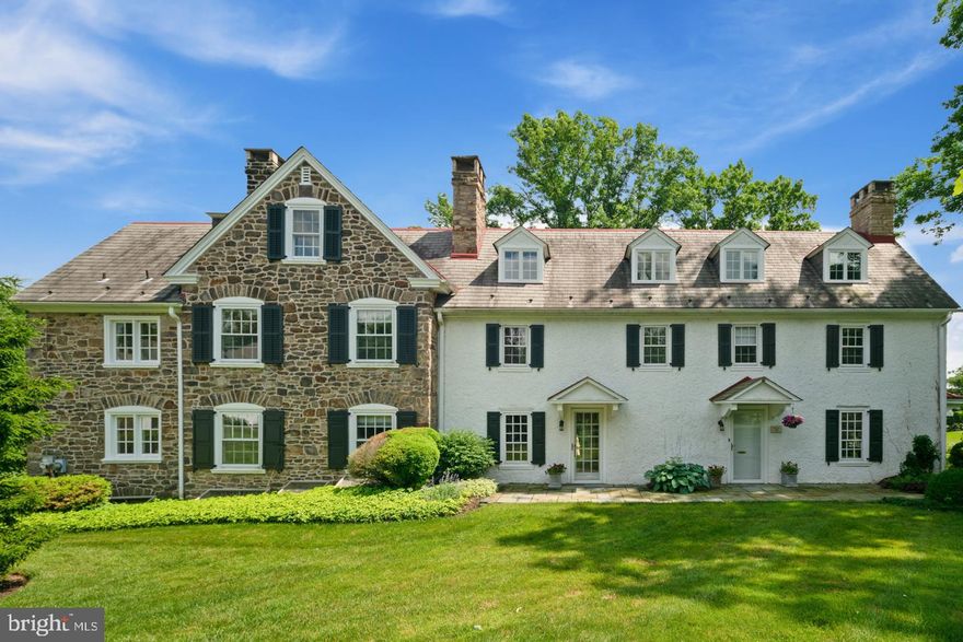 This stunning Bucks County stone farmhouse (circa 1730) offers old world charm with today s amenities. Once a local bed and breakfast, this magnificent home  was also featured as the Bucks County Designer house. When walking up to the home, take notice of the professionally landscaped gardens and mature trees. Once inside you will see gleaming hardwood floors as well as crown and custom moldings throughout the entire home. The great room off the home s entryway boasts plenty of natural light, a stone fireplace and exposed beams.  Just down the hall is the modern kitchen with upgraded stainless steel appliances, center island with cook top, plenty of cabinets for storage, and a corner workspace with desk. Off the kitchen is a butler s pantry with sink . Adjacent to the butler s pantry is the sun drenched dining room complete with recessed lighting and a cozy window seat. Pass through the french doors off the dining room into the amazing sun room which offers  floor to ceiling windows and breathtaking views of pond and surrounding areas. An oversized powder room and an office with a fireplace, custom built-ins and private entry way complete this floor. Reach the second level by using either the front or rear staircase and find a huge master suite with built-in bookcases, window seat, walk in closet, dressing room with built ins, an updated master bath with double vanity sink, soaking tub, even more built-ins,  and an oversized stall shower. A sitting room with fireplace and a second large bedroom with fireplace and full bath rounds out this floor. Venture up to the third level and discover four additional bedrooms and two more full baths. Outside you will find an oversized two car garage and a spring house, both of which afford additional storage. The hard work has been done for you so you can enjoy your days relaxing while the association maintains your lawn and clears your driveway. There is even a whole house generator for peace of mind. All this and just minutes from everything that Doylestown Borough has to offer. Home has been freshly painted throughout and hardwood floors have been recently professionally refinished.  Welcome Home!! Motivated Seller!