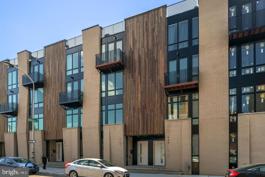 Located in the last phase of Liberty Square with unobstructed southern exposure, this stunning 4 bedroom, 4.5 bathroom 3,850 sqft. +/- home is a true stunner. The home features a massive open floor plan with huge custom Porcelanosa kitchen, hardwood throughout and fully tiled bathrooms with floating vanities. The first floor features a great size office and a huge 2 car garage. Head downstairs and you will find a massive finished basement with endless possibilities. The main living area features a designer kitchen with Bosch appliances, quartz countertops and high end appliances. There is also a deck off the kitchen which is perfect for grilling. The third floor features to en-suites, laundry room and a large deck! The HUGE owner suite takes the entire 4th floor. There is so much closet space in this home. The gorgeous owner suite bathroom features double shower heads, free standing tub and two separate vanities. The roof deck is not your average deck. It is leveled with Porcelanosa tiles that make it a durable yet attractive outdoor space. Photos are of home with same floor plan. 10 year tax abatement pending. Check OPA for 2019 taxes due to possible citywide reassessment. 3,850 square feet is approximate and includes both below grade space and above grade. The source is from the builder.