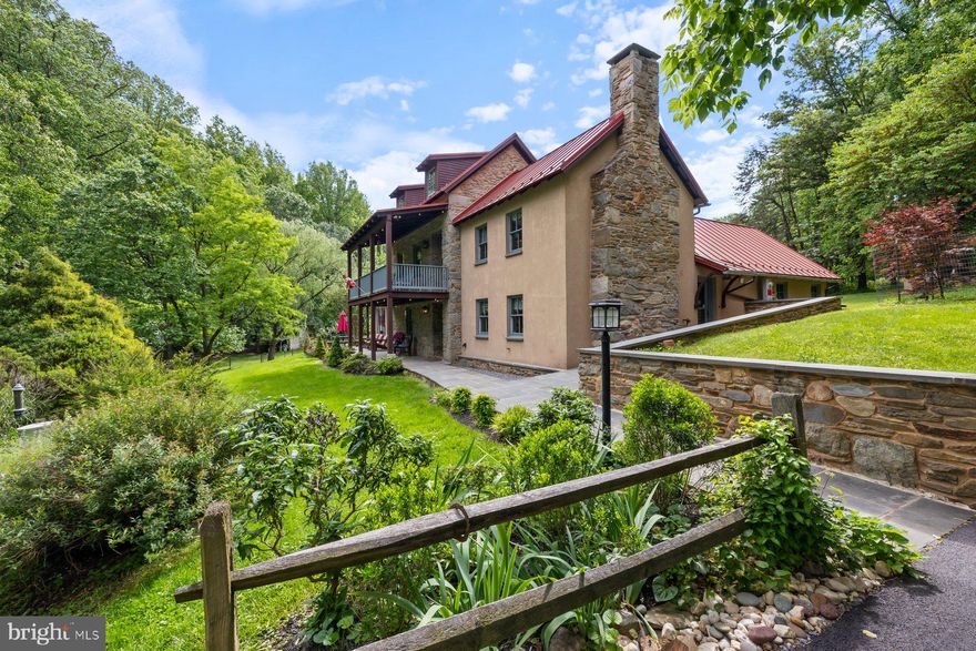 Award-Winning Historic Estate on 26 Private Acres......
Experience timeless elegance and modern sustainability in this impeccably restored, award-winning stone house, nestled on 26 acres of rolling pastures and mature trees. This one-of-a-kind property offers a rare blend of historic charm and contemporary amenities, all just a short drive from both Washington, D.C., and Baltimore.....Originally built in c.1800 as a worker's house for the Brookeville Woolen Mill, this architectural gem has been masterfully restored from a partial stone shell with meticulous attention to detail, preserving its original stone & stonework while integrating high-end finishes and energy-efficient upgrades—including solar panels for low-impact living......The main residence boasts four spacious bedrooms and three full bathrooms, including a luxurious primary bedroom with pastoral views. An attached in-law suite with a private entrance offers flexible living options.........Ideal for those seeking privacy, open space, and refined rural living, this estate also features expansive pastures, ideal for livestock or hobby farming, and multiple outdoor living areas perfect for entertaining or quiet reflection........A truly rare opportunity to own a historic estate that harmonizes classic craftsmanship, sustainability, and proximity to major metropolitan hubs.