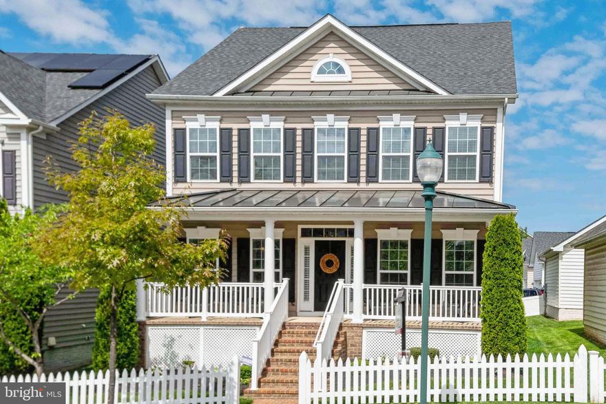 Welcome to this stunning Colonial nestled in the amenity-rich Clarksburg Village community, offering resort-style living with amenities such as a swimming pool, community center, and tot lot.   Meticulously maintained by the original owners, this home boasts nearly 4,000 sq. ft. of luxurious living space and a sun-filled open floor plan adorned with gleaming hardwood flooring.  The formal living and dining rooms exude elegance with accent molding and stately architectural columns, creating the perfect ambiance for entertaining guests. The gourmet kitchen is a chef's delight, featuring a peninsula island breakfast bar, granite countertops, rich wood cabinetry, and stainless appliances.  Retreat to the spacious primary bedroom suite, complete with an impressive tray ceiling, a walk-in closet, and a luxurious bath featuring a soaking tub, dual vanities, and a separate shower.   The finished lower level offers additional living space with a recreation room and abundant storage, complete with a bath rough-in. Enjoy outdoor living at its finest with a covered front porch, privacy-fenced backyard, and a convenient 2-car garage. Don't miss the opportunity to make this exquisite home yours!