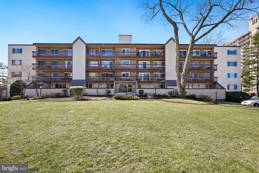Spacious, updated top-floor corner unit in West Springs Condominiums, just steps to Montgomery Mall, shops, and the movie theater. Enter through a welcoming foyer with a coat closet into a light-filled living room featuring gorgeous wood flooring and access to a private balcony with pool views. The living room flows into a large dining room with a picture window, creating a bright and open feel.
The thoughtfully renovated granite kitchen boasts a breakfast bar, stainless steel appliances, a gas double oven, and glass-fronted cabinetry. The kitchen has been reconfigured to open seamlessly to the dining and living areas, enhancing the home’s airy, open-concept design.
The generous primary bedroom features a wall of closets, an expansive window, and a beautifully renovated en-suite bathroom with a glass-enclosed shower with a niche and marble flooring. A bright second bedroom, a hall bathroom, and a linen closet complete the unit.
The spacious balcony provides room for outdoor seating and includes an exterior storage closet. This wonderful building offers prime convenience, steps from Westfield Montgomery Mall, Cabin John Park, and Home Depot, with easy access to I-270, I-495, and downtown Bethesda.
Zoned to top-rated schools: Ashburton Elementary, North Bethesda Middle, and Walter Johnson High School. Condo fee includes all utilities, cable, and amenities such as a swimming pool and picnic area. Covered parking space (P111) included.