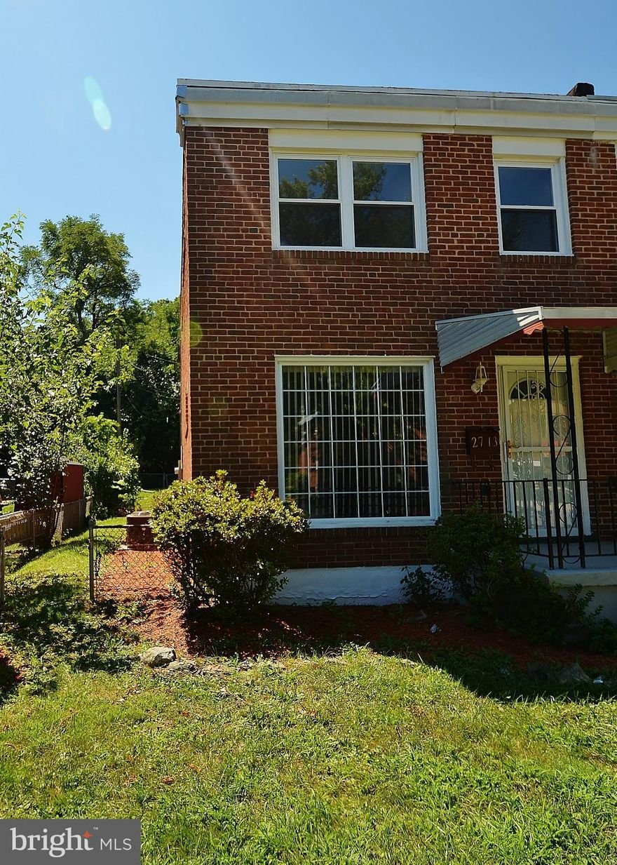 RENOVATED SEMI-DETACHED HOME WITH 3 FINISHED LEVELS! Hardwood floors throughout main level, beautiful kitchen w/42" cabinets, SS appliances, granite counter-tops, upper level w/3 bedrooms & 1full bath, finished LL w/1 full bath & open space for recreation, front & rear covered porch, large fenced yard, & parking pad! Walking to Cylburn Arboretum!