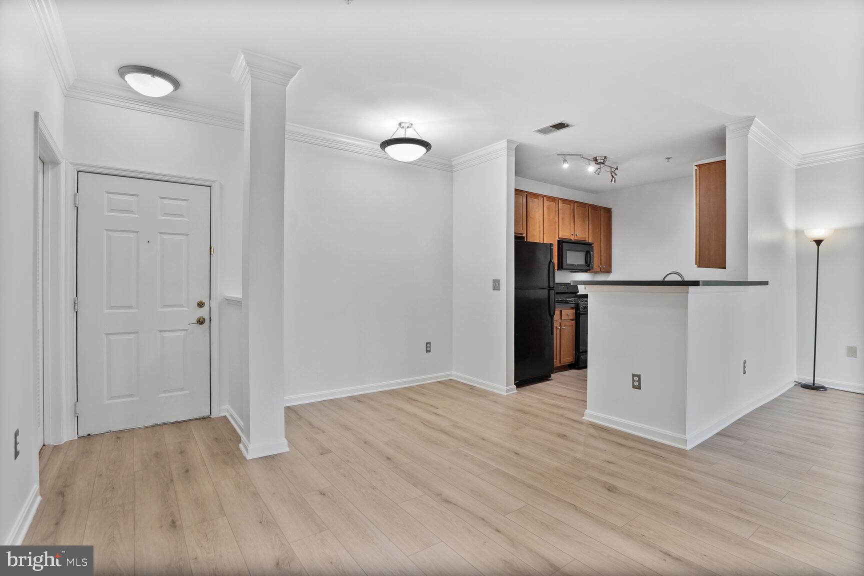 Beautifully updated one-bedroom, one-bath condo featuring a bright, open floor plan with fresh paint and brand-new flooring throughout. The spacious living area includes a large walk-in closet, while the galley-style kitchen offers a breakfast bar—perfect for casual dining or entertaining. Enjoy the comfort of an in-unit washer and dryer and relax on your private balcony.
Secure garage parking with one assigned space is included. The community provides resort-style amenities, including a swimming pool, fitness center, billiard room, basketball court, business center, conference room, and clubhouse, all set among beautifully maintained green spaces. Conveniently located near Metro with easy access to multiple transportation options.
No more than 2 incomes to qualify. Tenant's monthly income should be 4X the monthly rent. Preferred credit score 650 or higher. Military members please include a copy of LES with application.