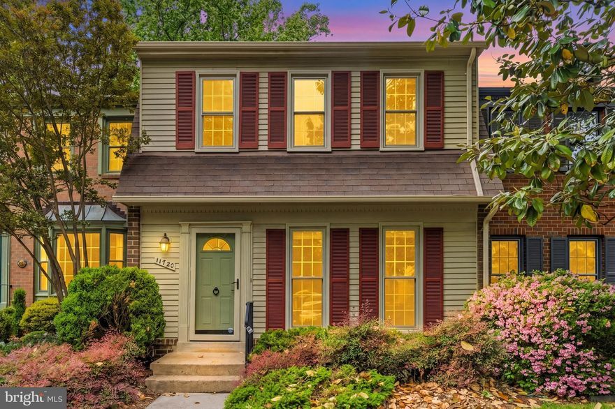 Welcome to 11720 Putting Green Court, a well-maintained 3-bedroom, 2 full and 2 half bath townhome in Reston offering golf course views and a private setting backing to the 8th hole of Reston National Golf Course.

The main level features hardwood flooring and an updated kitchen with upgraded cabinetry, pullout drawers, quartz countertops, stainless steel appliances, and an eat-in area with access to the rear patio. The outdoor space backs to the golf course and provides open views of the fairway.

The upper level includes three bedrooms, including a primary suite with a sitting area and walk-in closet. The walk-out lower level offers a recreation room with a brick fireplace, wet bar, new carpet, and direct access to the rear yard.

Recent updates in 2026 include kitchen renovations, new flooring, and updates to the primary and main-level bathrooms. Major systems include a Trane HVAC system (2023) and Rheem water heater (2024).

The property includes assigned parking and nearby visitor parking. Located within Reston Association, the home provides access to trails, parks, pools, and tennis facilities. Convenient to the Wiehle–Reston East and Reston Town Center Metro stations, Dulles Toll Road, and nearby shopping and dining. Golf course views, a private rear setting, and extensive 2026 updates combine to offer a well-maintained, move-in ready home in Reston.