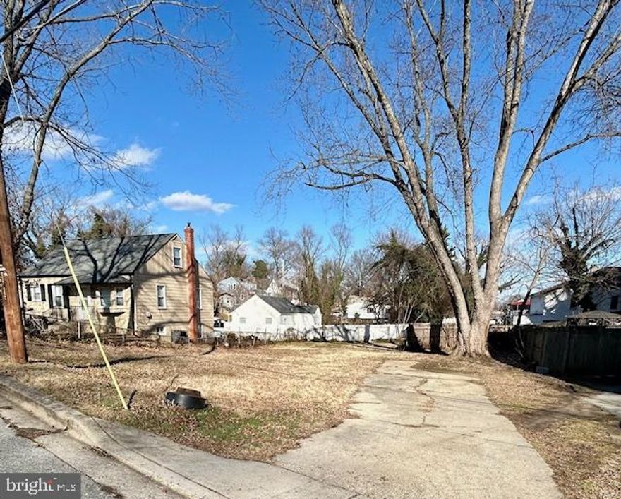 Vacant residential lot previously improved with a single-family dwelling. Lot has been civilly engineered and approved for new residential construction. Property includes an existing curb cut and driveway. Public water, sewer, and electric utilities previously served the site; buyer to verify current connection status and capacity.

Lot is generally level and suitable for infill development. Located in Capitol Heights with convenient access to major commuter routes, retail, and Washington, DC. Ideal opportunity for a builder, investor, or owner-user seeking a residential building lot with prior improvements.

Buyer responsible for all due diligence, including zoning, permitting, utility verification, and final plan approvals.
