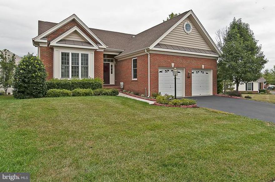 Great Value for Detached Home in  Regency  2 Finished Levels. Over 3600 finished Sq Ft 3 Bedrooms,3 Baths, Gourmet Kitchen with Hardwood Floors and Granite Counters&BreakfastBar Open to Dining Area and Great Room Plantation Shutters Detailed Molding Transom Windows Master w/ Tray Ceiling Amazing Finished Basement with Walk-Up  Covered Porch and Corner Lot!  Like New  Premier 55+ Community!