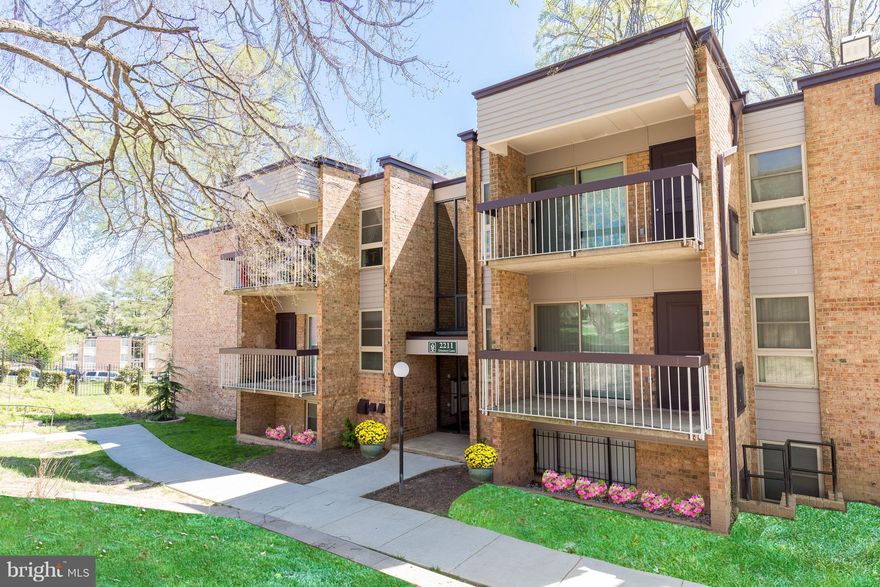 Spacious 2 bedroom, 2 bathroom apartment in a well maintained condominium.The glass doors from the living room open to a patio and a courtyard with a grill and picnic area.The living area has new wooden floors. The spacious bedrooms each have closets and carpeting. The open kitchen has granite counters with warm,wooden cabinets. The unit comes with one assigned parking plus one large storage unit.