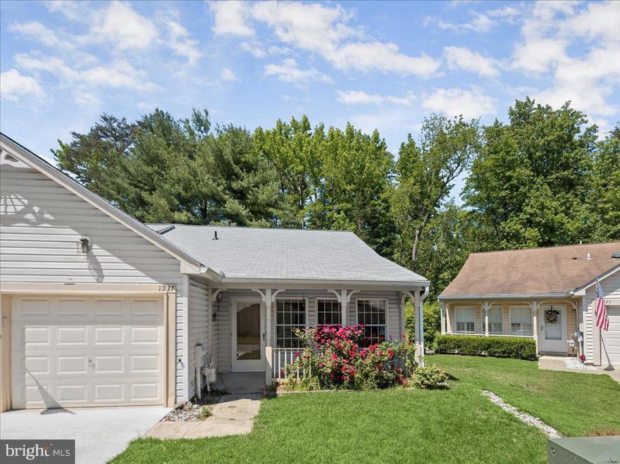 Great opportunity to own an end unit townhome in sought after Heritage Harbour, a 55+ community in Annapolis offering an array of community amenities!   The welcoming front porch overlooking the outdoor landscape beckons you to step inside to find an open concept floor plan, vaulted ceilings in the living room, and hardwood floors throughout most of the living space!   Exclusive to  end units, the side windows allow for an abundance of  additional natural light, along with extra outdoor space.  The kitchen features a breakfast bar, dining area, and this unit in particular also features a spacious family room/den off the back of the home, with sliding glass door access to the private, backyard deck.  The owner’s suite also overlooks the backyard and features an en-suite full bath and walk-in closet, and there’s a second  bedroom and full bath.  Roof was replaced in 2023.   Heritage Harbour is a vibrant community offering a lifestyle of leisure and recreation, including a golf-tennis court-clubhouse complex, indoor and outdoor pools, walking trails, tennis courts, and walkways to the waterfront access including pier with boat slips and kayak/canoe storage and sandy beach for launch.  The lodge is a focal point for gatherings and events, and includes an auditorium with dance floor, conference room, billiards room, and much more!  Easy access to Rts. 50 and 97, Annapolis Town Center and Westfield Mall!