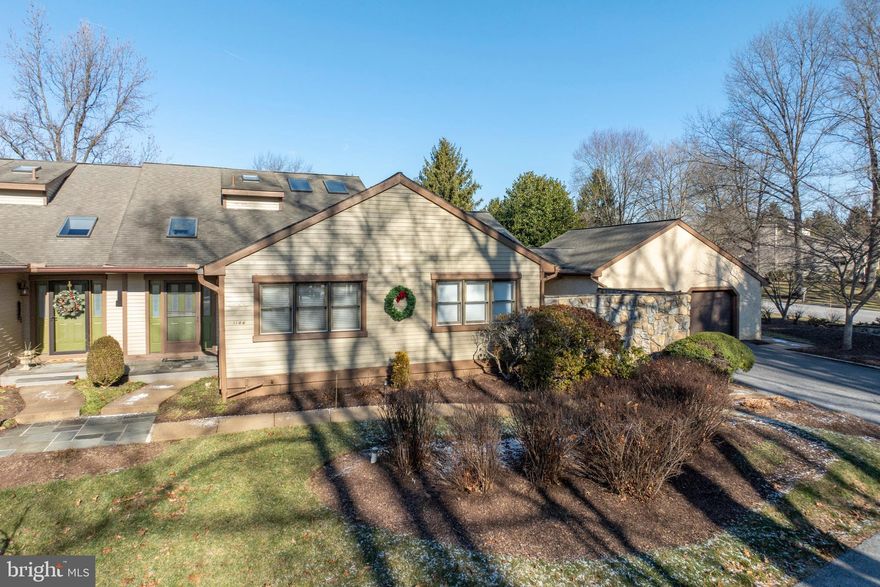 Find Your Lifestyle BLISS! Enjoy every day in this Hershey's Mill  carriage home situated on a desirable Newbury Lane home site with scenic golf course views to the rear--Beautiful! This gated, premier active adult community offers an incredible lifestyle.  Soak in the natural quietude and beauty of the preserved open space, park-like surroundings and scenery or many walking/relaxation spaces. Residents can also enjoy abundant neighborhood amenities, like swimming pool, tennis courts, recreation areas, clubhouse, golf (additional fee) and plentiful activities, groups/hobbies, get-togethers, and more! Participate as much or as little as you prefer. The immaculate residence welcomes you with a gracious, tiled, two story foyer and stylish, neutral decor. This versatile design allows you space to create everything from quiet reading/sewing nooks to TV/movie night space; Perhaps your perfect gourmet dinner (dining room or 3-season room); Or maybe just the perfect morning tea or coffee in the tranquility of the breakfast room. Experience the striking great room with eye-catching fireplace, dramatic vaulted, sky-lit ceiling and enchanting overlook from the second floor. The delightful dining room boasts fine moldings and triple windows AND opens to the three season room with ceiling fan and pleasant golf course/preserved space views! The home's heart center is the richly outfitted kitchen. Elegant cabinetry (including a fantastic pantry wall) provides ample storage. Distinctive quartz counters and granite island and the gleaming Brazilian cherry floors ooze star quality! Enjoy delectable  casual dining and serene rear views in the bewitching morning room accented by a vaulted, sky-lit ceiling and glass doors to the tranquil patio area. The first floor primary suite is especially enticing. With it's own personal patio, sizable walk-in closet w/organizers, built-ins, and sumptuous, tiled primary bath, this is a luscious retreat. The bath flaunts a jetted tub, tile shower and double bowl vanity. Bedroom two is also found on the main level--perfect for guests with mobility concerns. A full bath and laundry room complete the first floor. Ascend the graceful oak stairs to find the roomy loft and  "Wow" third bedroom with vaulted, sky-lit ceiling, PLUS third tiled, full bath. The huge, unfinished  basement provides plenty of storage and includes a cedar closet. The oversized 2 car garage awaits your pampered autos. UPDATED Heat adds  to the allure! Captivating comfort and convenience!