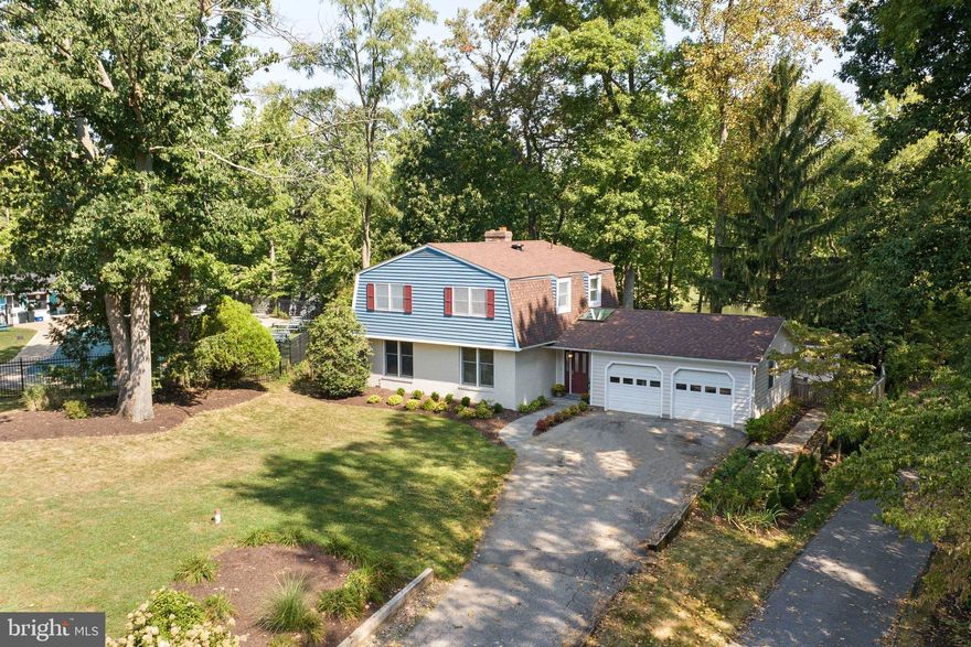 Gorgeous Deep-Water Waterfront conveniently located in Annapolis' Anchorage Community.  This 4 Bedroom, 2-1/2  Bath home with Oversized 2 Car Attached Garage has been freshly painted inside and out.  Large Primary Suite with wall of waterside windows has amazing waterviews, Newly renovated ensuite Bath and large Walk-in Closet.  Hardwoods on Main Level + updated Kitchen with Granite Counters.  Nicely landscaped with Hardscaped Patio overlooking the water and Stone Walkway and Stairs leading to your Private Pier with deep-water Slip on Lake Ogleton.  94 Ft of Protected Waterfront and Extra Wide Slip to accomodate a Catamaran.  Easy access in and out of your slip and quick access to the Bay.  All this just minutes from downtown Annapolis with its Iconic Waterfront, Restaurants, Pubs and Stores.  Ready for you to move in and enjoy life on the water.