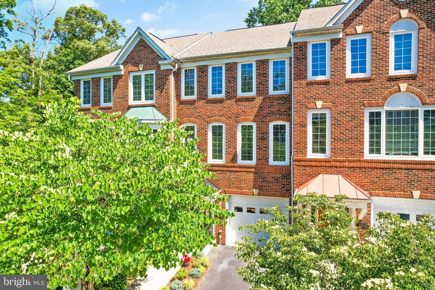 Welcome to this gorgeous brick front home in Burke! This home is nestled away in a private lakeside community, one of the newest in Burke. A rare find! The main floor features an open floor plan with an abundance of natural light beaming through oversized windows throughout. The kitchen sits in the center as the star of the show with brand new dazzling Quartz countertops, a large island and beautiful maple cabinets. The vast living room provides ample space for relaxation and entertaining. Enjoy the outdoors with your morning coffee or afternoon cocktail on the deck that backs to trees. The upper level has three sizable bedrooms and two full bathrooms. The family room on the lower level opens to a covered stone patio and a private fenced yard. This home offers many ADA compliant accessibility features such as no step entry at the front door and primary shower, base kitchen cabinets with roll out shelves, and a microwave in the center island to name just a few. Conveniently located near the shops and restaurants at Burke Centre Shopping Center and less than a mile walk to the Burke Centre VRE and Burke Farmers Market. Pool membership available at Burke Centre Conservancy allowing you access to five nearby pools.  A short walk to Lake Barton will serve as a refreshing escape from all the hustle and bustle. An absolute must see!