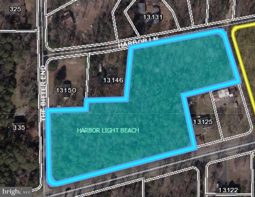 Rare find for the Lusby area ! Great location for a new home build, or perhaps a  detached garage or building. . Plenty of space for a home of your choice.  The property borders part of Rousby Hall Road,  Harbor Lane and the private road of The Bitter End.  . Recorded as part of Harbor Light Beach but not part of the HOA.    Recent perc and Approved Septic Permit . Access planned from
Rousby Hall Rd .  Rousby Hall Rd