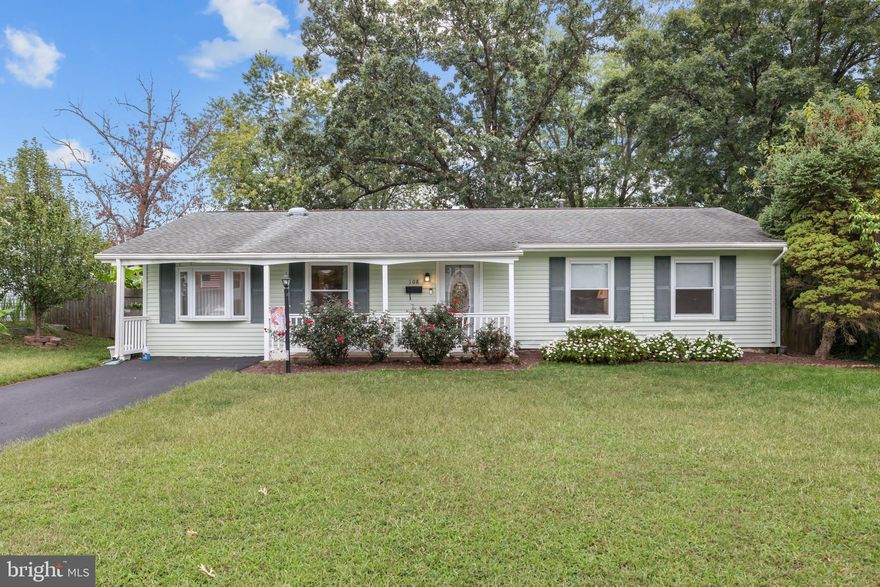 Beautifully maintained bright home is ready for it's next chapter. Enjoy hard to find main level living . Laminate Shaw wood style floors are throughout the main level.  The kitchen has plenty of cabinets and corian countertops - the refrigerator is new in 2025  (french-door and bottom freezer).   Primary bedroom is huge as it is two smaller bedrooms combined into one. The den is a possible third bedroom. It has its own mini-split system (cost of $8,000), box bay window and double closets. Seller will add a door if desired to make it a true third bedroom.  Full bath and half bath have both been updated. Kitchen door to backyard is brand new. Windows and roof are approximately  2012,  Leaf filter gutter guards were installed on gutters. Hot water heater 2015. The entire  house was rewired in 2012 and has a surge protector. Driveway entirely replaced in 2023. Brand new PVC front porch railing 2025. Updated vinyl siding, Large shed and back utility closet for plenty of storage. Large level yard  is fully fenced with gate. The patio is conveniently located right off the kitchen.  The HVAC and plumbing have been inspected and serviced 2 times year.