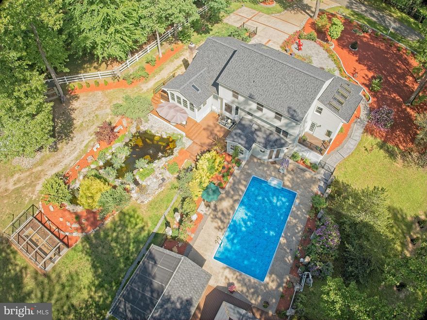 Rare opportunity to own this amazing, over 2.25 acre estate in Manassas. No HOA,  located at the end of a quiet, treelined cul-de-sac in beautiful Prestige Manor. This large estate has a 3 LV renovated home with 2-car garage, large sunroom addition, open, bright floorpan, large finished basement with walk-out access to the backyard and pool area, in-ground pool, a separate pool-house, fishpond, and beautiful gardens. It’s a private oasis to discover! Please come and enjoy nature at its best yet still near shopping, entertainment and major commuter routes.