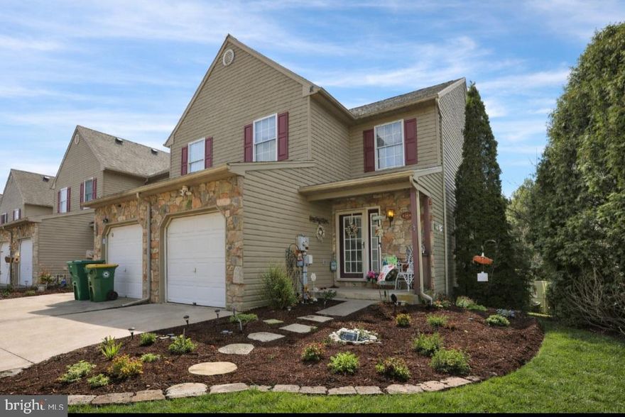 Welcome to this beautifully maintained end-unit townhome in the desirable Heritage Heights community, conveniently located near Route 222 and within the East Penn School District. This spacious home offers a perfect blend of comfort, functionality, and pride of ownership. The sun-filled living room flows seamlessly into the open-concept kitchen and dining area, featuring countertop seating and a brand-new stove—ideal for everyday living and entertaining. Sliding glass doors lead to a large Trex deck overlooking a private, tranquil backyard filled with mature landscaping, vibrant plantings, and blooming gardens—truly a gardener’s dream. The fully finished lower level adds valuable living space with a cozy family room and a private office, perfect for remote work or flexible use. Upstairs, the primary suite features vaulted ceilings, great closet space, and a beautifully updated bath with a  walk-in shower, tile floors, and double vanity. Two additional bedrooms and a full bath complete the upper level. Efficient gas hot water and a heat pump provide year-round comfort. This home offers the perfect combination of indoor elegance and outdoor serenity—don’t miss this opportunity in Heritage Heights!  Conveniently located to parks, shopping, restaurants, and roadways.