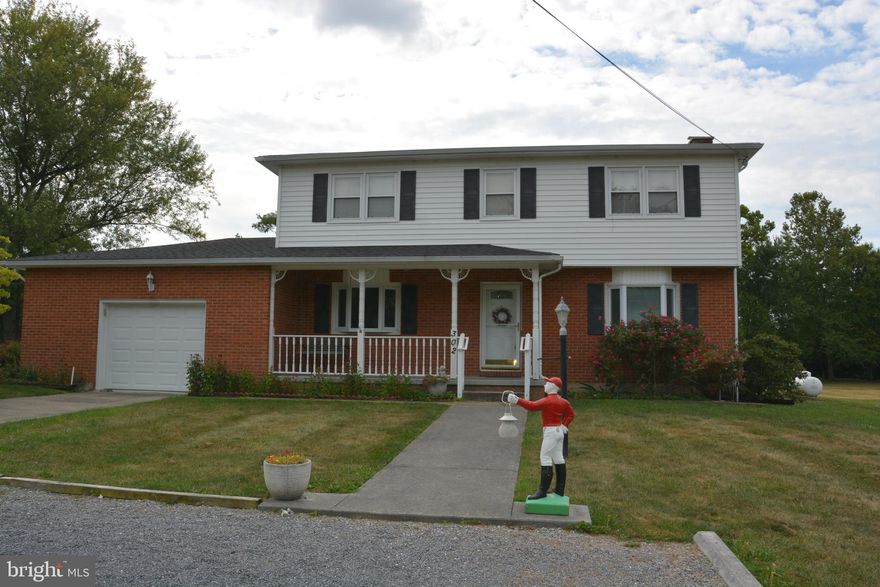 This very comfortable and well maintained 2 story home was built in 1975.  There is beautiful hardwood flooring throughout.  3 of the 4 upstairs bedrooms are quite spacious.  The 4th bedroom has an added closet and was used as an office.  The heat pump is a more recent addition, offering heating and cooling.  The home offers a formal dining room and an updated kitchen.  The living/family room is 25' long and has a gas log fireplace. There is an oversized attached garage, plus a detached garage and 2 garden sheds.  Just under an acre of level land; the deep rear yard has a garden spot.  Add a firepit to use up all the stacked and cut wood at the back of the property.  Relax on the front or rear covered porches.  This is a very quiet neighborhood, NO HOA and the main road is not a thoroughfare.  This is a great location, just minutes from I81 and the Rt 37 Bypass.
