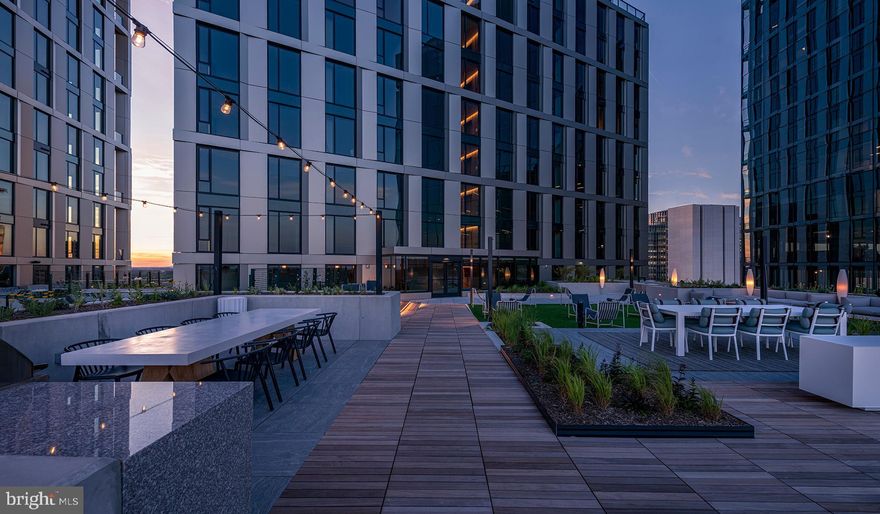 Experience the Pinnacle of Urban Living at The Elm, Bethesda

Nestled in the vibrant heart of Bethesda, adjacent to the bustling Bethesda Row, The Elm presents an exquisite blend of modern living and environmental consciousness, certified by its prestigious Gold LEED status. Our diverse range of homes, including studio, 1-, 2-, and 3-bedroom options, are meticulously designed with contemporary finishes, state-of-the-art stainless steel appliances, and an unparalleled location in the center of Bethesda.

Elevate Your Lifestyle with Exceptional Amenities. At The Elm, indulgence meets convenience. Soar to new heights of relaxation at our 28th-floor rooftop pool or embrace wellness at our modern fitness center. The 17th-floor landscaped terrace offers a serene escape, while our expansive Skybridge on the 28th floor provides a unique vantage point. Our community spaces, including lounge areas and workspaces, cater to your every need, mere steps from a plethora of dining and retail options.

Discover Unparalleled Living Spaces. Our homes and penthouses boast double-height ceilings, bathing each space in natural light. Revel in the luxury of walk-in closets and modern kitchens equipped with Bosch and Samsung appliances. Select homes further enhance your living experience with private balconies and patios.

Immerse Yourself in the Cultural Hub of Bethesda Row. Reside in the epicenter of culture, dining, arts, and entertainment. The Elm is a stone's throw away from Woodmont Triangle, a vibrant nexus of cultural activities and community events. Enjoy an array of outdoor concerts, art festivals, and farmer's markets that animate the neighborhood year-round.

Redefine Relaxation and Productivity. Our rooftop pool is not just a swimming facility; it's an oasis of tranquility with resort-style seating and stunning panoramic views. The Elm's numerous spaces are designed for your relaxation, health, and convenience, offering a myriad of ways to unwind and rejuvenate.

Your Personal Sanctuary and Community Awaits. Whether you're immersing yourself in a captivating novel or engaging in meaningful conversations, The Elm offers the perfect backdrop. Our curated fitness studio caters to health enthusiasts with a convenient and inspiring workout environment. The 28th-floor Skybridge is an ideal spot for hosting events or enjoying private gatherings, all while being surrounded by breathtaking views.

Schedule Your Personalized Tour Today. We are dedicated to providing an exceptional living experience. Contact us to schedule a tour tailored to your preferences. The Elm is proud to be a smoke-free and pet-friendly community. Welcome to a new standard of living, where every detail is crafted for your comfort and convenience.

** Pricing and availability subject to change on a daily basis ** Photos are of model units ** Parking may be available for an additional fee **