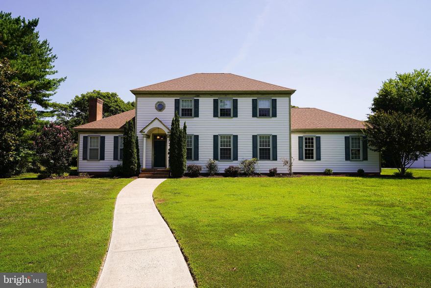 Brafferton contemporary colonial, masterfully-designed + expertly-built by Don Patterson, a legendary Salisbury-area builder, known for his artisanship, exceptional quality, and attention to architectural details. 3BR+bonus, 2.5BA, attached 2-car garage on 0.69+ acre homesite in the prestigious Braffteron community - minutes to Downtown Salisbury, Bypass, University, boutique and big box stores - yet tucked away on a residential street in a neighborhood of gorgeous homes. Hardwood flooring, crown molding, and arched doorways through the foyer, spacious formal living room, and formal dining room. Plenty of space to relax or entertain in the family room w/wood-burning fireplace, sliders to the rear deck and patio. Kitchen offers an informal dining area, sizeable island, stainless steel appliances, additional storage in the custom, built-in hutch. Nice-sized laundry room w/ sink + cabinets. Guest half bath completes the first floor. Upstairs - handsome + durable engineered wood flooring throughout. Large primary bedroom w/engineered wood flooring, attached bonus room for office space or additional closet space, walk-in closet, full, en-suite bathroom - jetted tub/shower combo, double-sink vanity, linen closet. 2 additional bedrooms, and a 2nd flex / bonus room with a skylight. Full guest bath w/tub/shower combo, oversized vanity. Just a little love will bring this stately home back to life! Sizes, taxes, distances approximate.