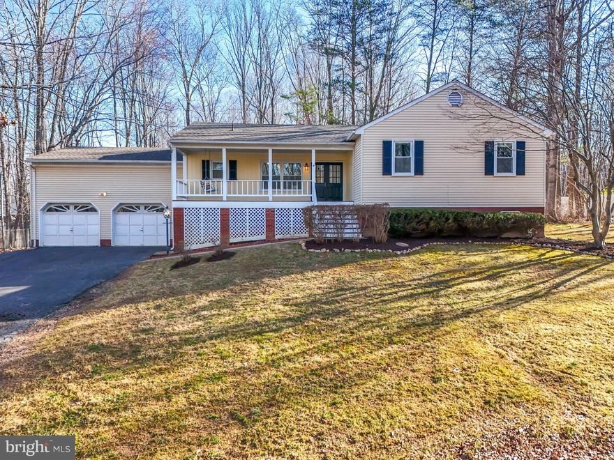 Perfect Opportunity to be a homeowner in the desirable Cannon Bluff Estates  -- this main level living home has beautiful views sitting on almost 1.5 ares with 2 car oversized garage, spacious deck and porch; flat yard, fenced back yard with lots of maintenance already taken care of: Thompson Creek Energy Efficient windows installed 2011; Roof 2016; Vinyl Siding replaced rear of house 2020; New Water Heater 2023; Distribution box replaced 2023; Pressure tank and water filtration system replaced 2024; tree work and landscaping 2025; Kitchen has SS appliances and granite; skylights throughout... This home has such potential w/an open airy feeling when you walk in - vaulted ceilings and pellet stove in the family room which walks onto deck...Garage is oversized with work bench area; Large deck in great condition, fire pit out back, fenced yard, with a quaint front porch and swing to take in the views of the woods and wildlife. Shed is sold as is. Located mid county - easy for commuting to 95; close to shops, restaurants, hospital. It is a community run HOA with private access to beautiful trails, boat launch/ramp and the Occoquan River for fishing and picnic area.  Visit at one of the open houses Friday 4:30-6:30 and Sat 12-2pm. Don't miss out on this awesome chance to get into this neighborhood and make it your own little oasis!