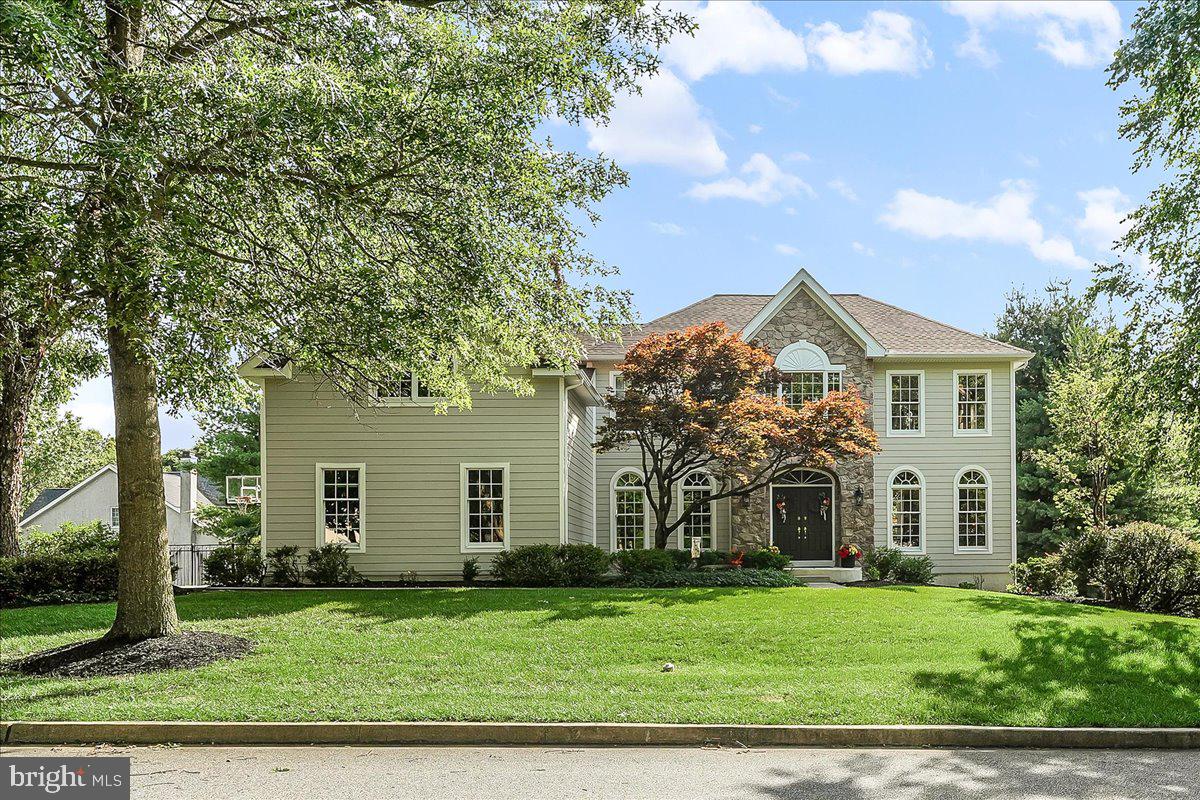 Just an exceptional home, on a premium lot, in Garnet Valley Woods backing to Grist Mill Park! You will immediately notice the full exterior upgrade with new Hardie Siding (2024)! In true Toll Bros fashion, this home has a fantastic layout! Formal living room and dining room have hardwood floors, crown moulding and chair rail. On the other side of the 2 story grand foyer, sits the first floor office with built in book cases and chalk board wall! The gourmet kitchen upgrade features an extra bump out with granite counters, stainless appliances including double ovens (2 yrs old) and gas cooktop, plus a huge granite island! The sliders exit to a the Timbertech Deck overlooking an incredible flat, fenced back yard. The family room adjoins the kitchen and has a four foot bump out (basement as well). There is a stone, floor to ceiling, wood burning fireplace, flanked by added side windows, and 2 skylights! Just a ton of natural light and afternoon sun! Head to the upstairs by using the back staircase! The primary suite is huge with 2 walk in closets, tray ceiling, recessed lighting, decorative columns and a sitting area, The primary bath has a soaking tub, shower, dual sinks and a skylight! The 2nd bedroom is a princess suite, with its own private bath and built in shelves. There are 2 additional beautiful bedrooms, both sizable and an updated hall bath with dual sinks. The lower level is a daylight, walk out finished basement with just an incredible layout adding versatile living space. The closets are amazing. There is a full bath, home theater area and a wet bar with granite, sink and beverage fridge. Current owners used this space as a game and recreation area, but it could easily be considered for in-laws or guests as well. To complete the list of outstanding features, 3 car garage, holiday lighting package, dual zoned HVAC, 1st floor wired for surround sound, new driveway (2024) and fresh paint in many rooms! Many systems are newer, but we are also including a AHS 1 year home warranty for additional peace of mind. If you are looking for the total package, Garnet Valley Schools, fantastic location and lot, close to all major roads and DE tax free Shopping too,, this is your new home!