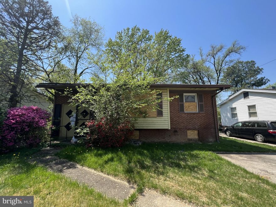 **Property is condemned due to severe FIRE DAMAGE and therefore CANNOT BE ENTERED.**Only exterior previews are allowed, and no interior showings.**DO NOT make any attempt to enter the property but feel free to walk around the property's exterior front and backyard. **Whether you are a first-time home buyer who would love to get your hands on a great project or a seasoned investor, this home is for you. Come showcase your architectural abilities and great design in this lovely Split Foyer home with many incredible opportunities. 2BR/2BA on the main level and lots of room on the lower level to create an amazing and cozy living experience. The basement had an additional bedroom with room for more. Walkout side entrance/exit. Nice, fenced backyard, rear entrance/exit from the kitchen, and many great features that make this home a great buy! Drive by, look, and submit an offer and let's make this home your next great buy! Great opportunity for Sweat Equity. Public transportation routes. Centralized location for all DMV attractions. Shops galore, restaurants, malls, plazas, name it, they are all nearby. Also, easy access to 495, I-95, and many other major roads. The Home is fully available to all buyers for immediate possession.
