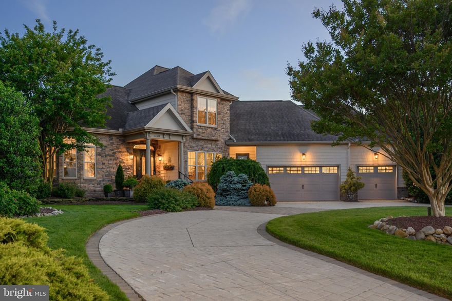 Custom built with great detail by Monogram Construction.  This was the original MODEL HOME in Lighthouse Sound!  Lots of built-ins and very spacious rooms.  THREE-CAR garage that is heated and cooled. 
This REMARKABLE golf course features the longest cart bridge in America stretching nearly 1,500 feet!
Designed by Arthur Hills, this 18-hole championship course offers magnificent scenery of the bay and marsh that will challenge all of your golfing skills. This home is located on the 2nd tee with the saltwater marsh and bay behind! 
Choose between the FIRST OR THE SECOND FLOOR primary suites.  BOTH offer walk-in showers AND soaking tubs (one even has Jacuzzi jets!)
The list of amenities in this home are astounding. The amenities are presented with a professional brochure... 
Last but certainly NOT least, just WAIT until you feast your eyes on the dramatic and huge water fall feature in the back yard!!!  You'll never want to leave this neighborhood OR this home!   Enjoy fine dining and your favorite beverage in the Lighthouse Sound Restaurant!   Lighthouse Sound only contains 90 building lots.  Originally a beautiful bay front farm, you can still see the grain silo as part of your panoramic landscape!!  Furnishings might be included for the right price!!