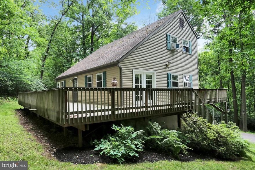 3 bedroom home on wooded 1.5 acre lot. Eat in kitchen, fireplace and cathedral ceilings in living room and first floor laundry room and full bathroom with heated floors.  Master bedroom with private deck/balcony. Full basement and two car attached and one detached garage for plenty of storage.