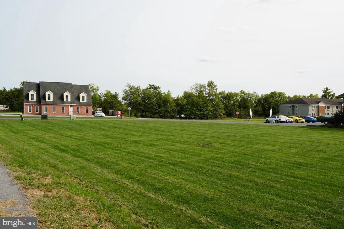 CARRERA MEDICAL COURT! Discover the perfect opportunity for your medical or professional practice with this .62-acre lot, pad finished and equipped with all utilities at the site. This property has a level terrain and a completed paved driveway and is ready for development. Ideally located near Berkeley Medical, various medical practices, and a one-day surgical facility, it offers unmatched convenience. Plus, it's just minutes from I-81, schools, and shopping centers. Don’t miss out on this prime location—call today for more information!