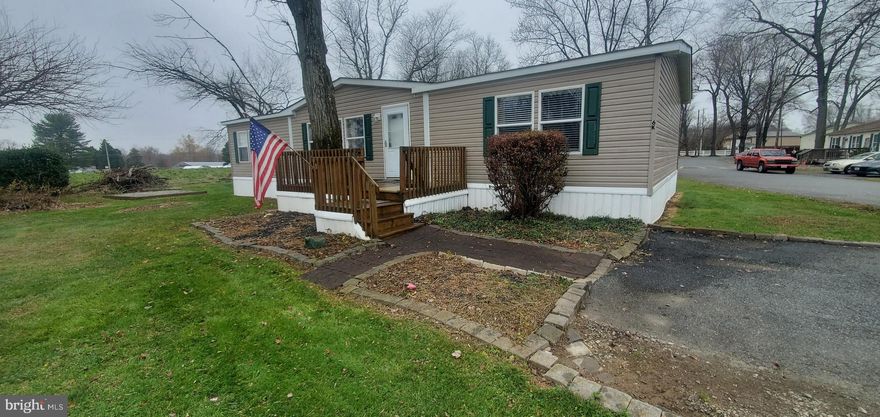 Welcome to 6 Kenneth Drive in Rising Sun MD!  This home is located in The Bay Country Estates park.  Three full bedrooms and two bathrooms large living room with a wood burning fireplace.   Spacious kitchen and living room ensures you will have ample room for family and friend gatherings.  If you have been looking for a home under 100k make sure you do not miss looking at this!  Main bedroom bathroom has double sink stand up shower and bath tub.  There is also a full hall bathroom.  The home is ready for your finishing touches to call home.  Open house 12-01 from 5pm to 7pm and Sunday 12-03 from 11am to 1pm