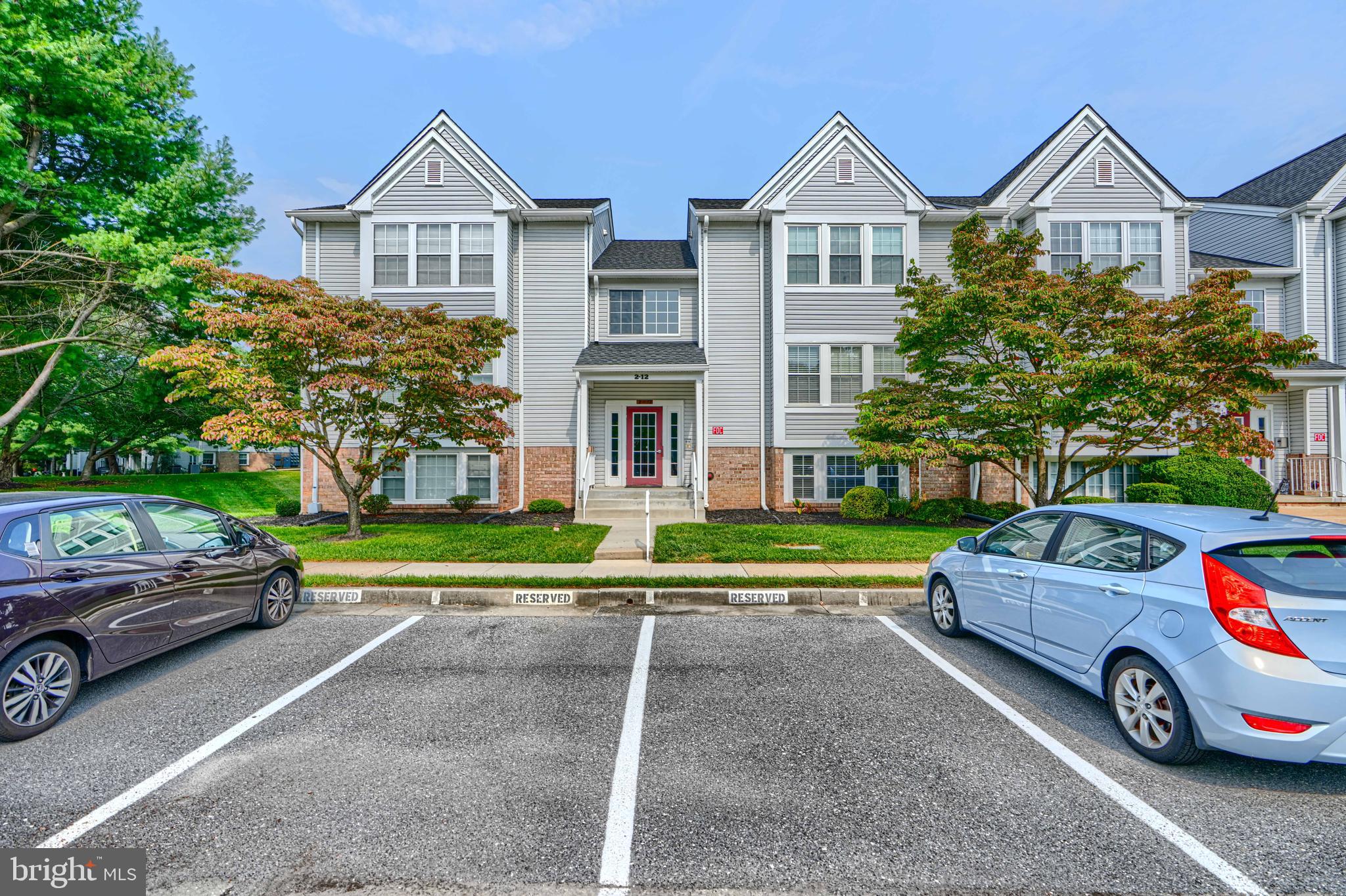 Welcome to 4 Whips Lane, in Red Fox Farms, a beautifully maintained ground-level condominium offering comfort and convenience in the heart of Nottingham. This one-bedroom plus den, one-bath home features an open floor plan that makes the space feel bright and inviting. Enjoy peaceful wooded views from your private patio, easily accessed through sliding glass doors. Reserved parking ensures everyday ease, while thoughtful details include six-panel doors, a separate laundry room with washer and dryer, and additional storage space. Lovingly cared for by its original owner, this home is in great condition and truly move-in ready—perfect for anyone seeking a low-maintenance lifestyle in a desirable location close to shops, dining, and commuter routes.