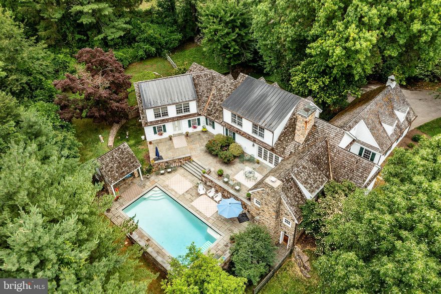 Take notice of this remarkable masterpiece located in the highly sought-after Chester Springs area! Every aspect of this stunning dream home in Chester Springs showcases elegance and meticulous attention to detail. With 4 bedrooms, 3 full and 3 half bathrooms, and a 2-car garage, this magnificent property sits on a secluded 2.5-acre lot, allowing you to connect with nature while enjoying the in-ground saltwater pool. Surrounded by scenic views, mature trees, and beautifully landscaped grounds, this colonial-style home offers spacious living with exceptional architectural features such as a cedar shake roof, copper gutters and downspouts, and a rear copper roof.
Inside, you'll find handcrafted finishes and upgraded amenities throughout. The house combines updated, open spaces filled with natural light with vintage architectural details, including original wide plank floors, exposed beams, and three working fireplaces. The luxurious first-floor primary suite includes a private bath, a spacious closet, and French doors leading to a stunning slate patio overlooking the saltwater pool and pool house. The state-of-the-art gourmet kitchen, with granite and wood countertops, is a chef's delight, featuring Wolf appliances, a Sub-Zero refrigerator, Pro Vent, two dishwashers, a large pantry, and breathtaking views. The kitchen opens to a gorgeous cathedral-ceiling family room with a wood-burning fireplace and more incredible vistas.
The finished lower level offers stone flooring, a powder room, an exercise room, and a family room with access to the beautiful slate patio and in-ground saltwater pool. Additional features of the property include a radiant floor heating system, an entire house generator, and a carriage house. The list of upgrades is extensive and too numerous to mention!
Located between the historic Yellow Springs and the quaint village of Birchrunville, this newly renovated estate provides the perfect combination of privacy and convenience. It offers easy access to major transportation routes such as US Route 202 and the Pennsylvania Turnpike, providing convenient access to the Main Line and Center City Philadelphia. If you're looking for the perfect place to call home, don't hesitate to schedule your private tour of 1123 Saint Matthews Road today.
