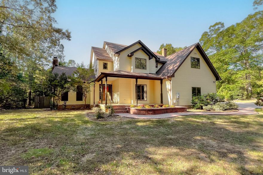 This beautiful, one of a kind, contemporary style home has plenty of character and is awaiting its new owners. Prepare to be wowed upon entering the front door when you’re greeted by a massive great room to the left with gorgeous cathedral ceilings, a brick wood burning fireplace and an abundance of windows with natural lighting. To the right you’ll see the formal living room with a large bay window and window seat overlooking the front yard. Down the hallway, you’ll discover the magnificent kitchen complete with a center island, cook top, wall oven, and a brand new refrigerator and new dishwasher. You’ll love the ample amount of cabinets and the pantry for storage, as well as the open concept layout for cooking and dining. All 3 bedrooms can be found upstairs, including the incredible primary suite with an enormous walk in closet and primary bathroom that has double vanity sinks, a soaking tub and walk in shower. Complete with built in book shelves, a window seat, tall ceilings and recess lighting, this space is sure to impress! The primary bedroom also has a balcony overlooking the back yard, perfect for enjoying a cup of coffee in the morning and listening to the sounds of nature. Additional features include several original wooden pocket doors throughout the home, a central vacuum system, and an original (vintage) intercom/radio. Wait! There’s More! This home also has an attached two car garage with a work bench/ shelving and electric doors with remote access. Step outside and enjoy the amazing deck and gazebo, perfect for entertaining guests and relaxing. The back yard also has a wooden privacy fence, perfect for pets. This property sits on nearly 5 Acres in a highly sought after location in Leonardtown with no HOA. The large 12’ x 16’ lean-to shed conveys and is perfect for the storage of lawn equipment, toys and tools. This home has a brand new roof (2024) and the furnace was replaced approximately 4 years ago and has been maintained regularly, giving the new owner peace of mind for years to come. Make an appointment today and come see it before it’s gone! You don’t want to miss this one!